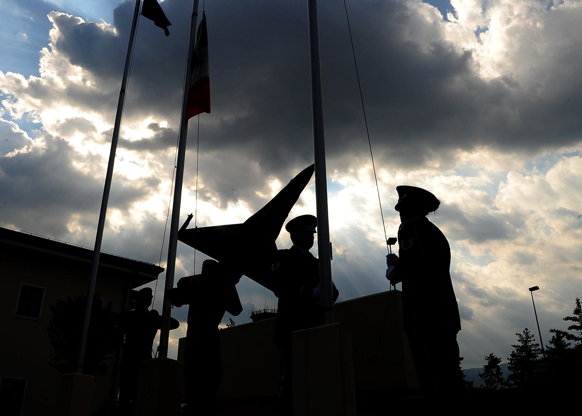 Aviano Honor Guardsmen perform a Memorial Day retreat ceremony May 25 at Aviano Air Base, Italy.  Memorial Day was formerly known as Decoration Day which originated after the American Civil War to commemorate the Union soldiers who died. (U.S. Air Force Photo by Staff Sgt. Evelyn Chavez)