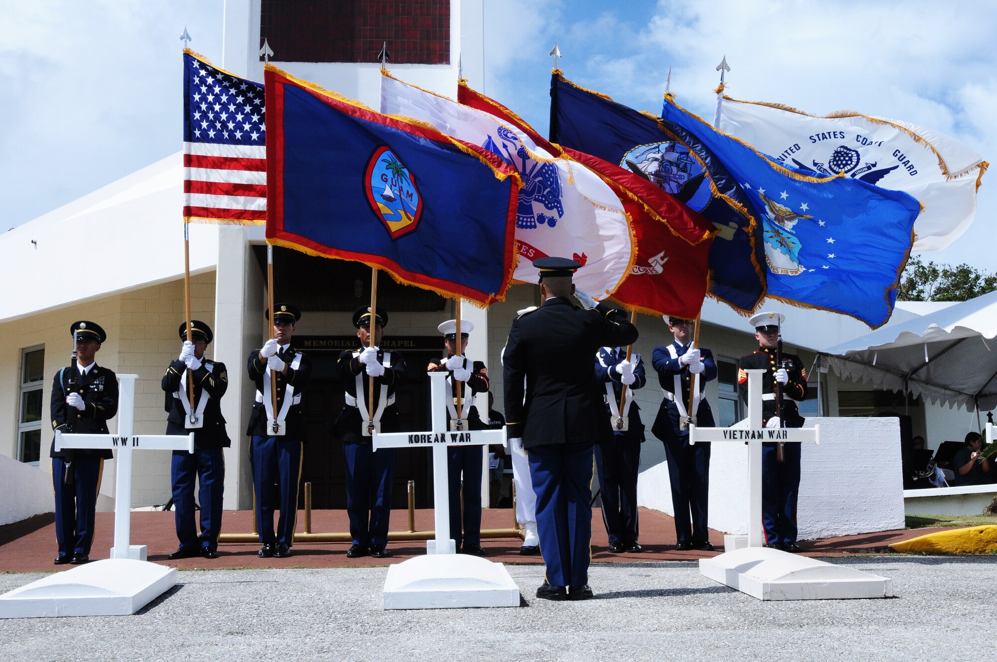 ANDERSEN AIR FORCE BASE, Guam- The colors are presented by members of the Armed Forces on Guam at the Guam Veteran Cemetery Memorial Day ceremony May 28. The color guard consists of men and women currently serving in different branches of the military on Guam.(U.S. Air Force photo by Senior Airman Carlin Leslie/Released)