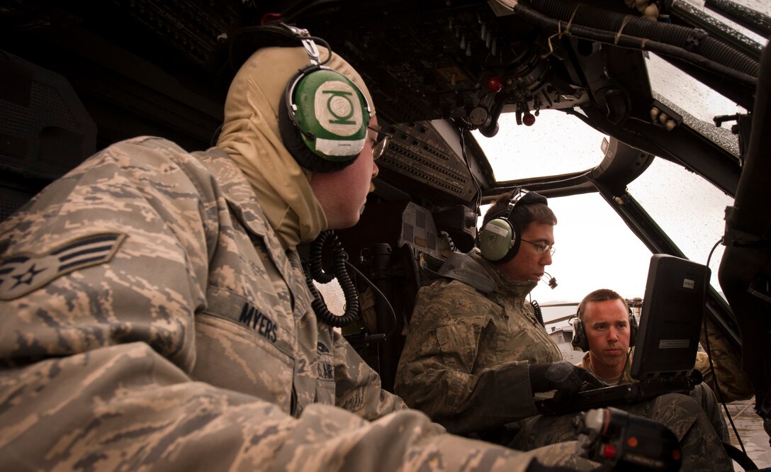 Maintainers from the 33rd Expeditionary Helicopter Maintenance Unit perform routine maintenance on a U.S. Air Force HH-60G Pave Hawk helicopter at Bagram Airfield, Afghanistan, May 25, 2012. The 33rd EHMU is tasked with keeping Bagram's Pave Hawks ready to fly in support of NATO and Afghan forces at a moment’s notice. (U.S. Air Force photo/Capt. Raymond Geoffroy)