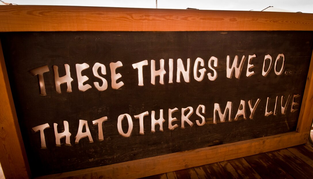 The motto of the U.S. Air Force’s Pararescue team adorns a deck next to the operations compound of the 83rd Expeditionary Rescue Squadron at Bagram Airfield, Afghanistan, May 25, 2012. Pararescue crews rely on their maintainers to keep their HH-60G Pave Hawks in peak condition so they can fly in support of NATO and Afghan forces at a moment’s notice. (U.S. Air Force photo/Capt. Raymond Geoffroy)