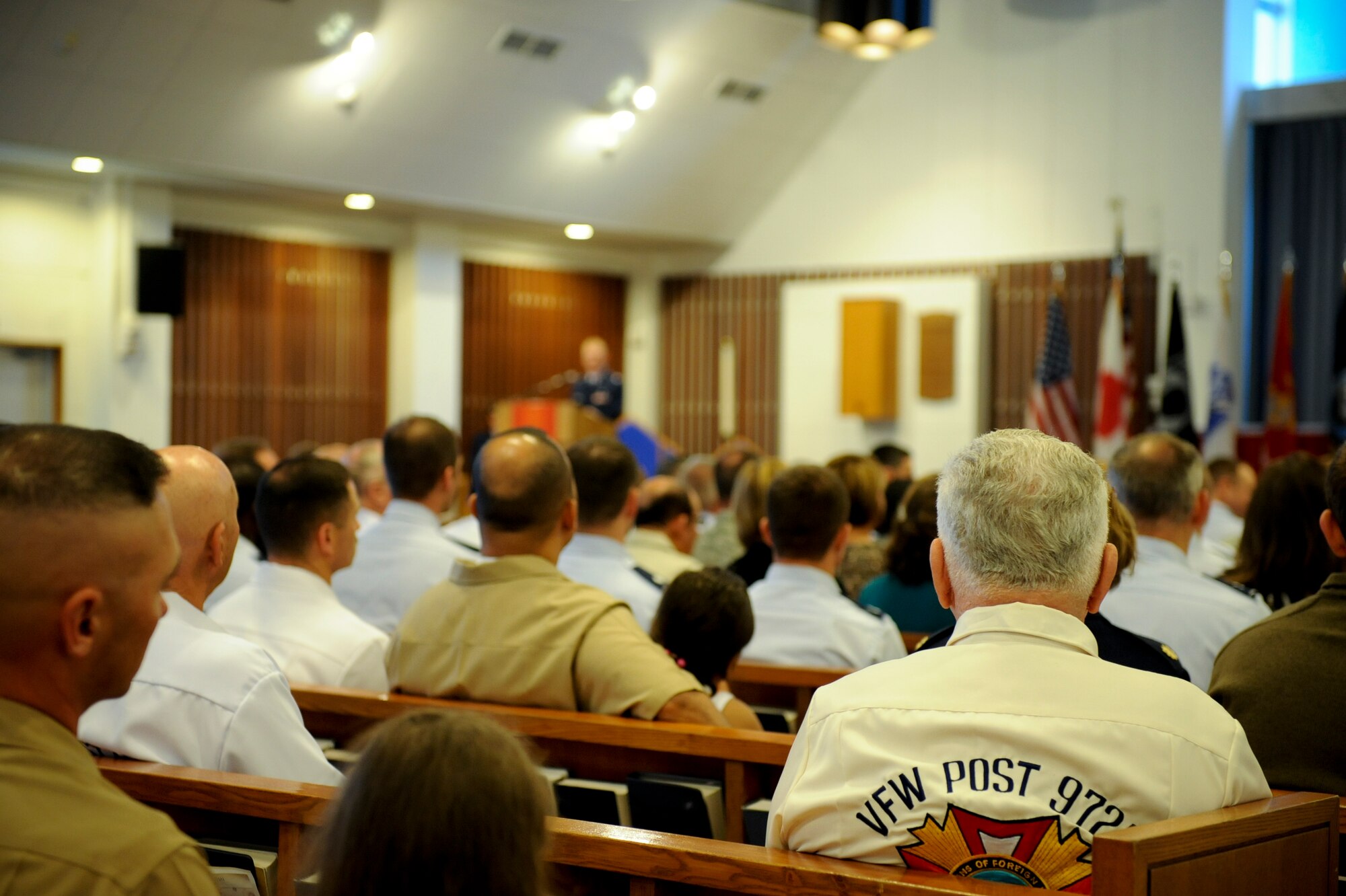 More than a hundred service members, families and veterans reflect during a Memorial Day ceremony at Chapel 1 on Kadena Air Base, Japan, May 28, 2012. Formally known as Decoration Day, Memorial Day is now observed as a day to remember those who have made the ultimate sacrifice so that the nation may live free today.  (U.S. Air Force photo/Airman 1st Class Brooke P. Beers)