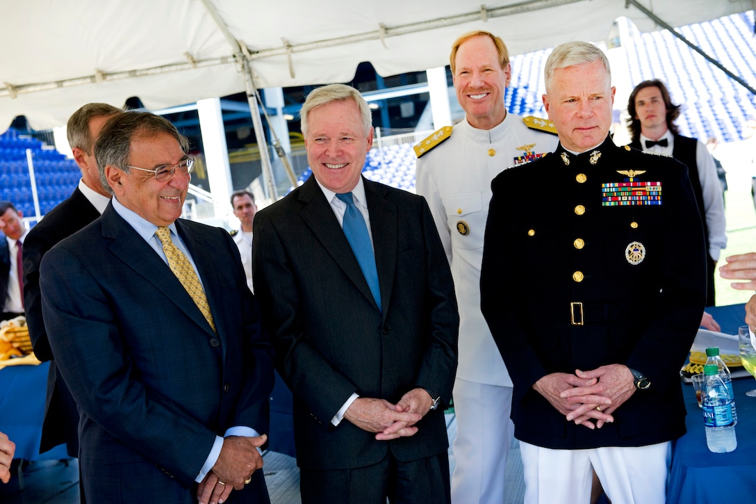 Defense Secretary Leon E. Panetta, right, Navy Secretary Ray Mabus, center, United States Naval Academy Superintendent Vice Adm. Michael H. Miller, left rear, and Commandant of the Marine Corps Gen. James F. Amos, far left, attend a briefing before the United States Naval Academy 2012 Graduation and Commissioning ceremony in Annapolis, Md., May 29, 2012.