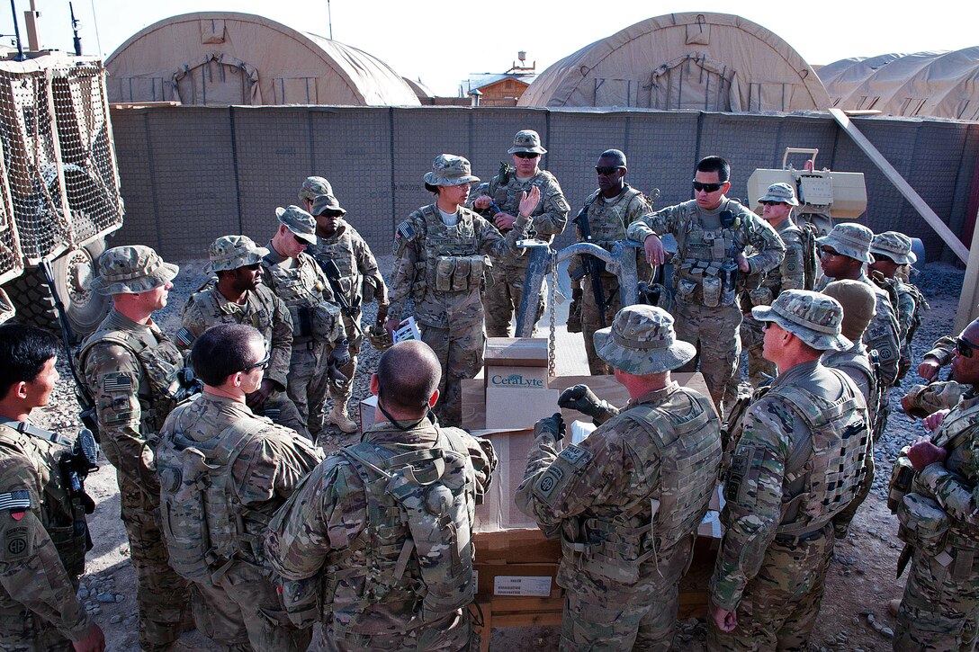 U.S. Army 2nd Lt. Debora Pleitez gives a mission brief before leaving Forward Operating Base Arian on a combat logistics patrol in Afghanistan's Ghazni province, May 26, 2012. Pleitez, a platoon leader, is assigned to the 82nd Airborne Division’s Company F, 2nd Battalion, 504th Parachute Infantry Regiment, 1st Brigade Combat Team.