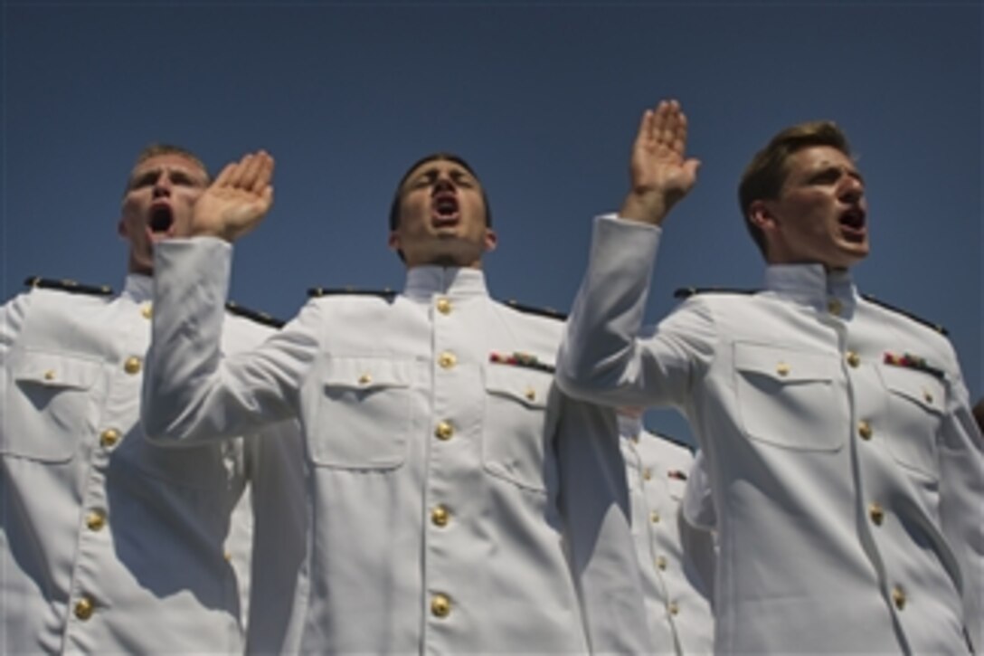 U.S. Navy Midshipmen take the Oath of Office at the United States Naval Academy 2012 Graduation and Commissioning ceremony in Annapolis, Md., on May 29, 2012. 