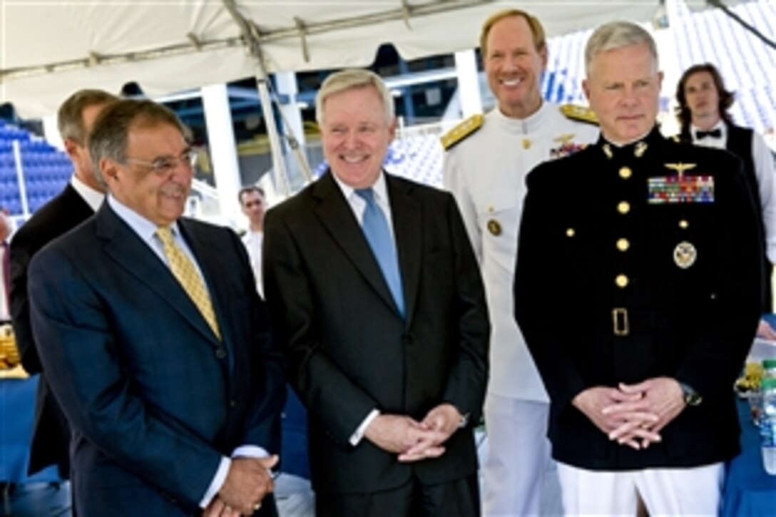 Defense Secretary Leon E. Panetta, right, Navy Secretary Ray Mabus, center, United States Naval Academy Superintendent Vice Adm. Michael H. Miller, left rear, and Commandant of the Marine Corps Gen. James F. Amos, far left, attend a briefing before the United States Naval Academy 2012 Graduation and Commissioning ceremony in Annapolis, Md., May 29, 2012.