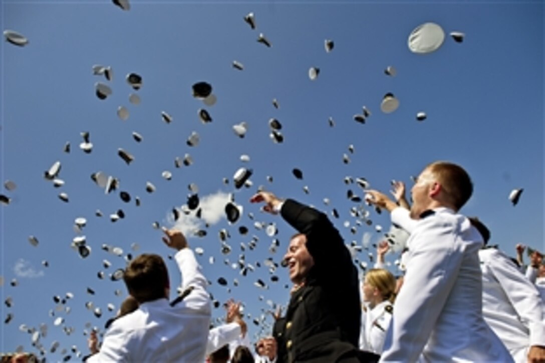 Newly commissioned Navy and Marine Corps officers toss their caps at the conclusion of the United States Naval Academy 2012 Graduation and Commissioning ceremony in Annapolis, Md., May 29, 2012.