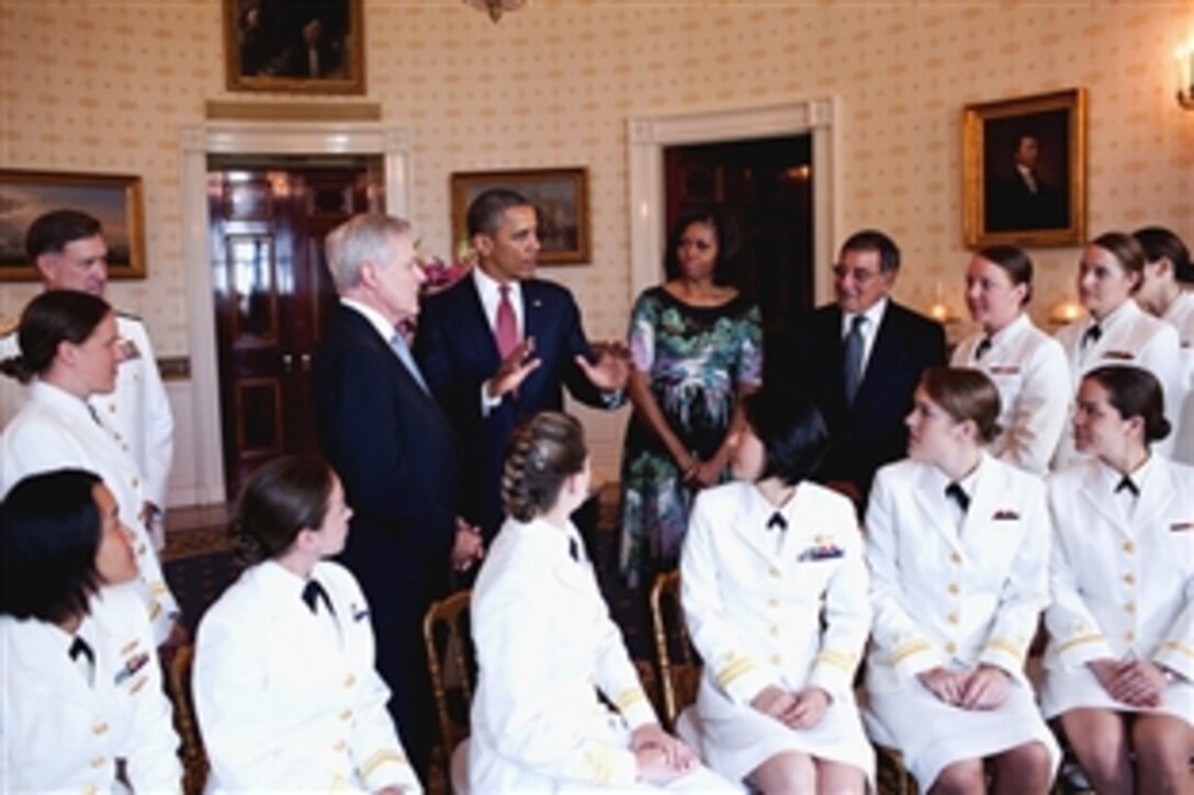 President Barack Obama and First Lady Michelle Obama greet the first contingent of women sailors to be assigned to the U.S. Navy’s operational submarine force in the Blue Room of the White House, May 28, 2012.