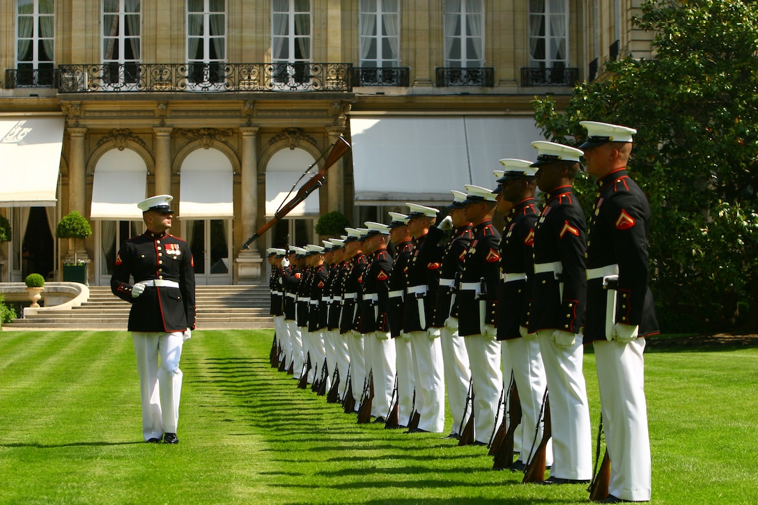 Lance Cpl. Ryan McKinley, Marine Corps Silent Drill Platoon rifle inspector catches an M1 Garand rifle during a Battle Color Ceremony at the American Ambassador's Residence in Paris May 29.