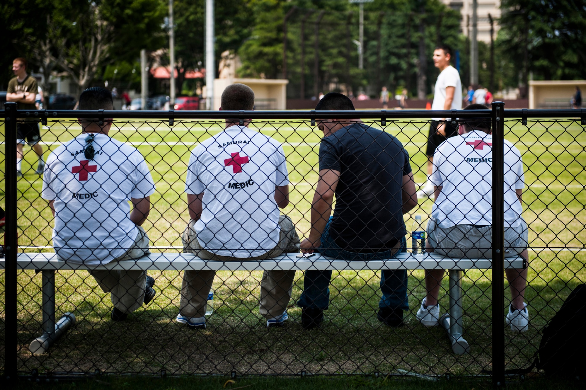 YOKOTA AIR BASE, Japan -- On-scene medics stand by to help with any injuries during the sporting events at Airmen Appreciation Day at Yokota Air Base, Japan, May 29, 2012. (U.S. Air Force photo by Staff Sgt. Samuel Morse)