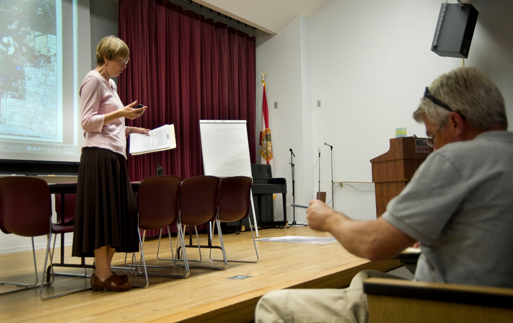 Dr. Karen Chapman, director of Okaloosa County Health Department, speaks at Northwest Florida State College, about the health hazards caused by the local wildfire in Fort Walton Beach, Fla., May 30, 2012.  Chapman urges caution around areas affected by smoke. (U.S. Air Force Photo/Airman 1st Class Naomi M. Griego/RELEASED)
