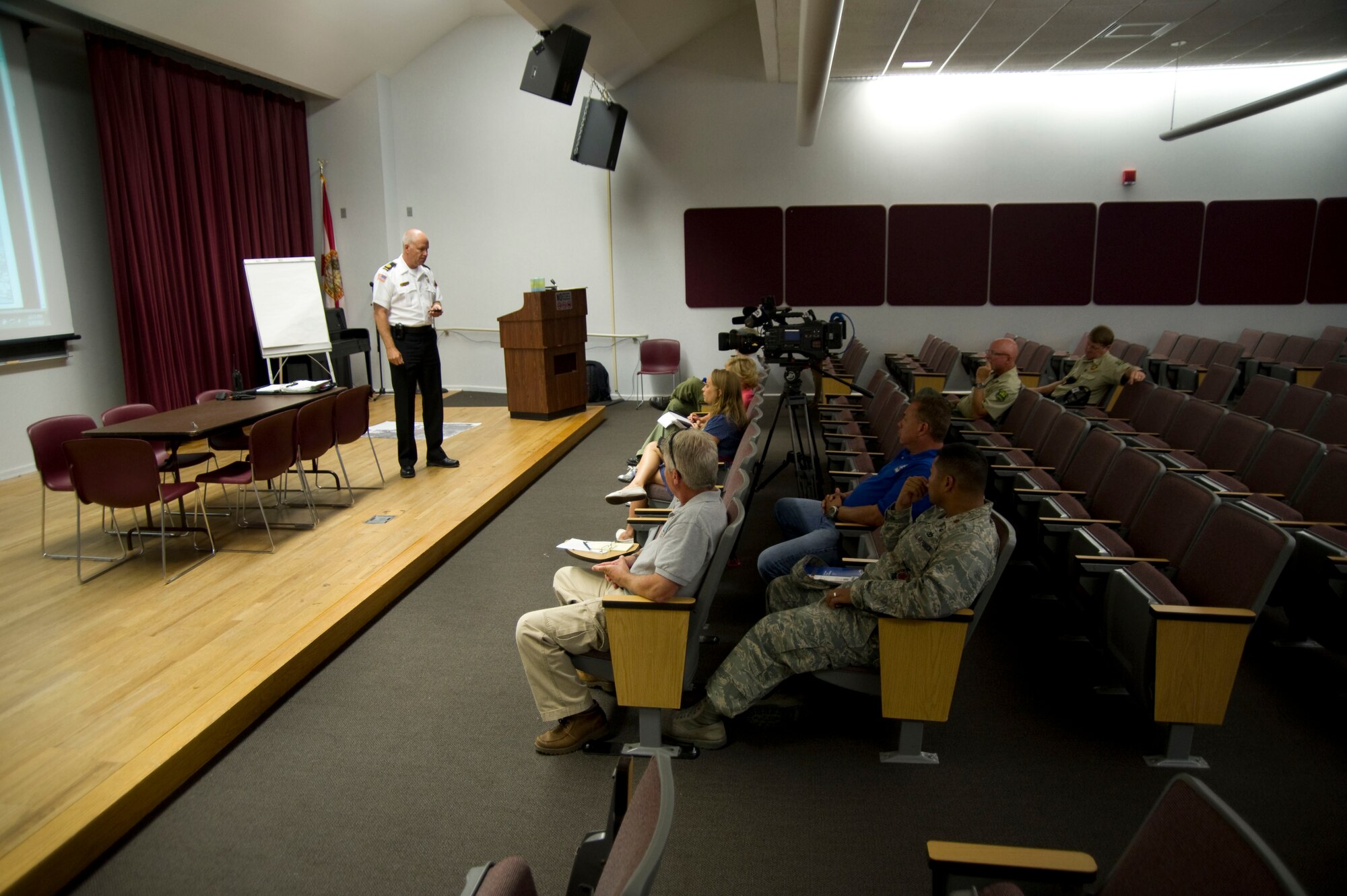 Mark Giuliano, fire chief for 96th Civil Engineer Suadron, speaks during a press conference regarding wild fires at the mobile operations center housed at Northwest Florida State College in Fort Walton Beach, Fla., May 30, 2012.  Guiliano is working with Hurlburt Field as well as other local resources to contain the fire. (U.S. Air Force photo/Airman 1st Class Naomi M.Griego/RELEASED)