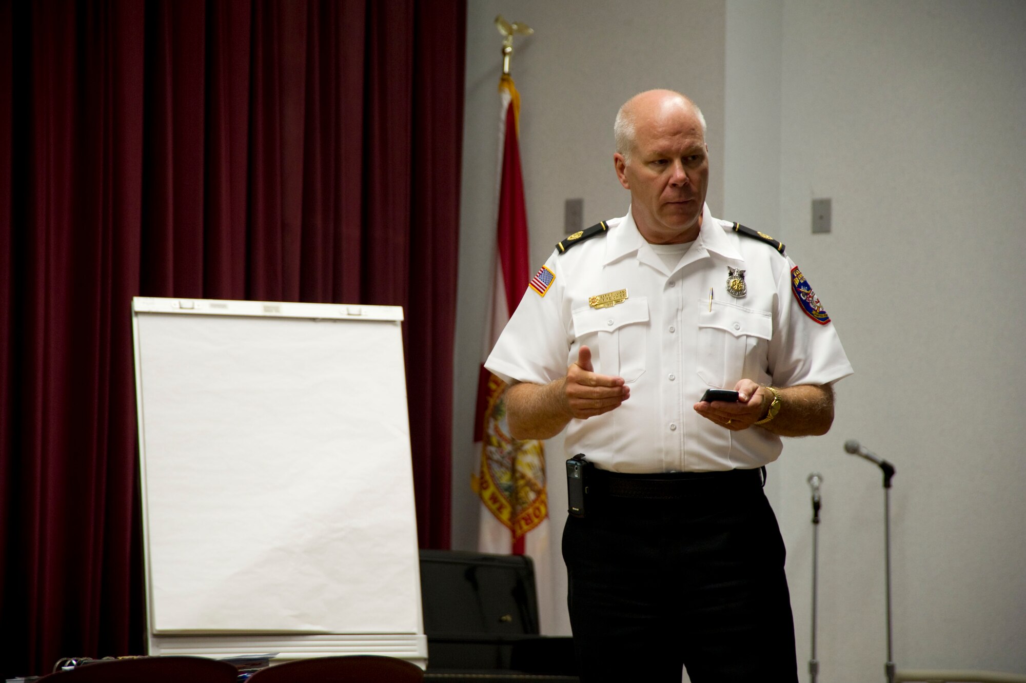 Mark Giuliano, fire chief for 96th Civil Engineer Suadron, speaks during a press conference regarding wildfires at the mobile operations center housed at Northwest Florida State College in Fort Walton Beach, Fla., May 30, 2012.  Guiliano is working with Hurlburt Field as well as other local resources to contain the fire. (U.S. Air Force photo/Airman 1st Class Naomi M.Griego/RELEASED)