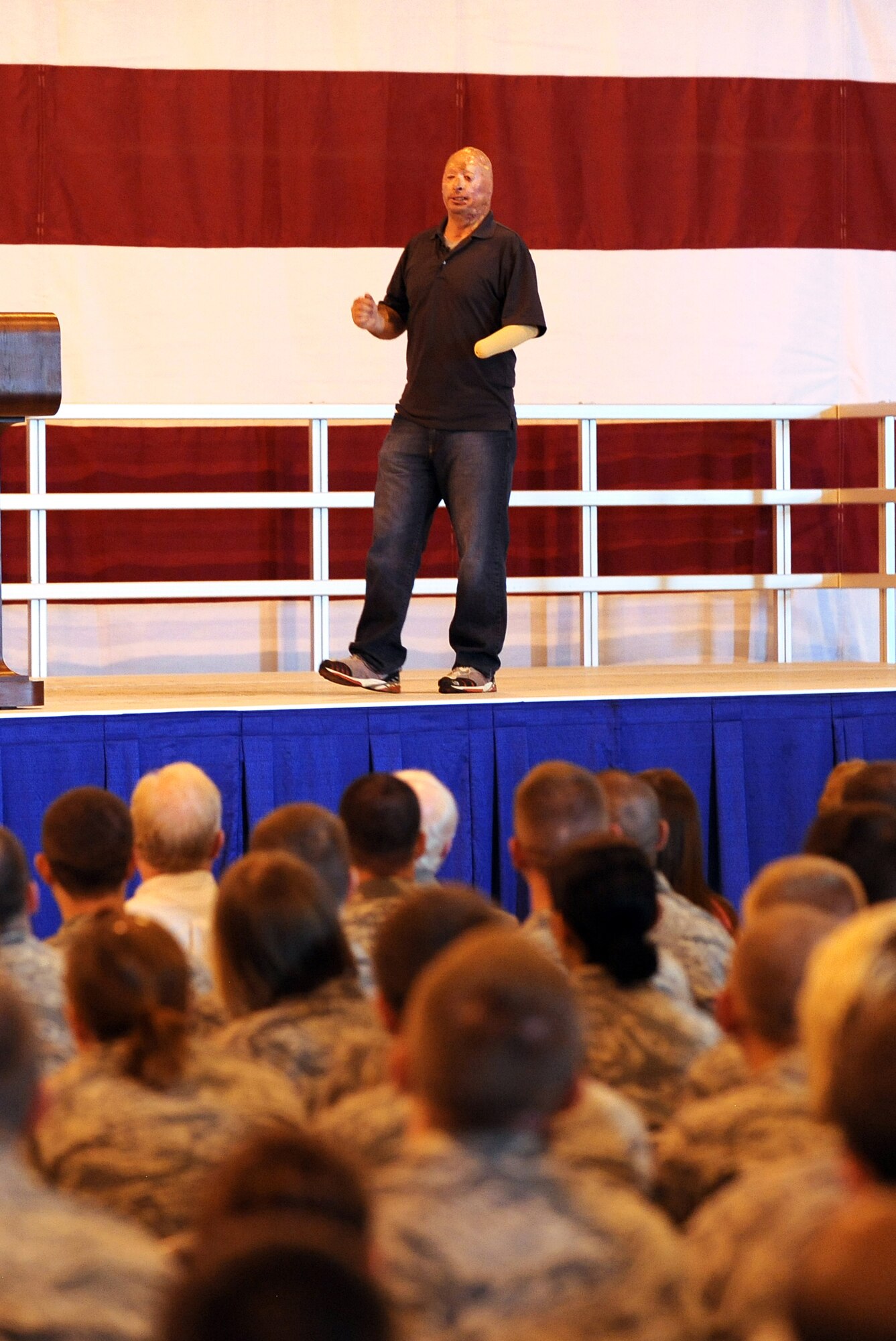Bobby Henline, a former U.S. Army staff sergeant who was the victim of an IED attack in Iraq, was the guest speaker at a Special Airman's Call May 24 inside the Bennie Davis Maintenance Facility on Offutt Air Force Base, Neb. Following the IED attack, Henline had burns to more than 35 percent of his body and has had more than 40 surgeries during his recovery. (U.S. Air Force photo by Josh Plueger)