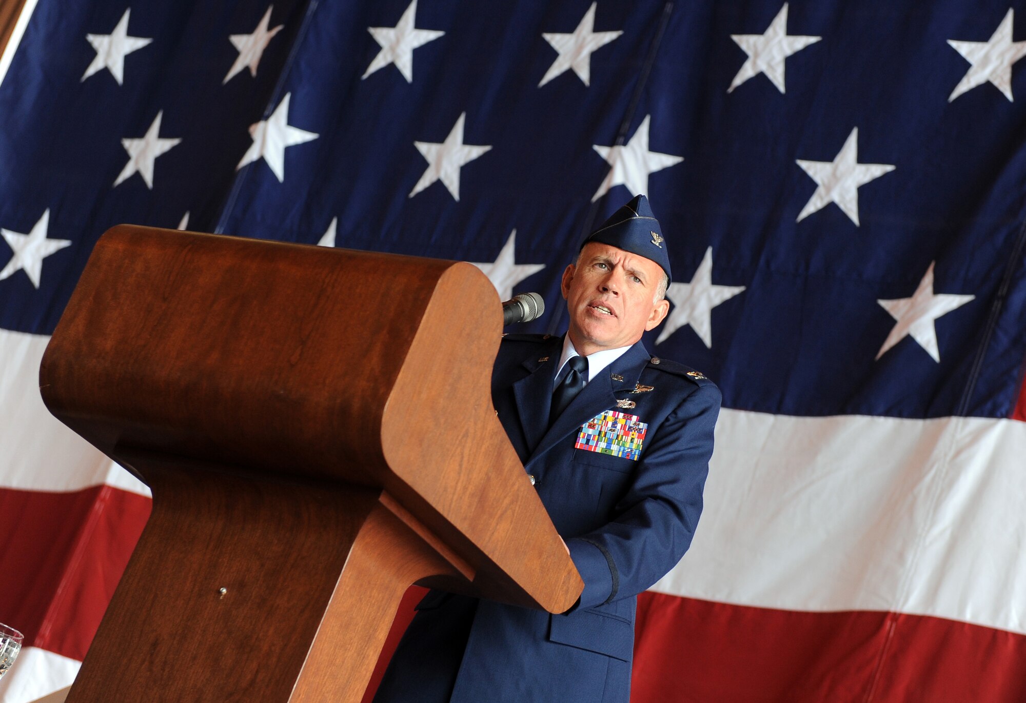 U.S. Air Force Col. Russell Mammoser, 55th Operations Group commander, addresses 55th OG Airmen after he accepted command of the group during a change of command ceremony May 24 in Dock 1 of the Bennie Davis Maintenance Facility at Offutt Air Force Base, Neb. (U.S. Air Force photo by Josh Plueger)