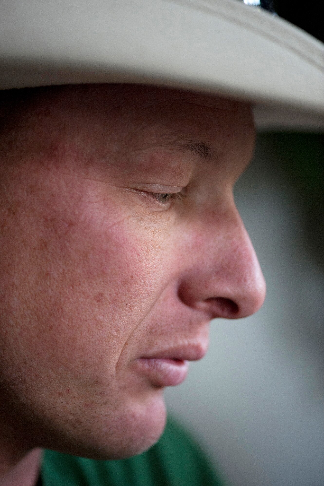 U.S. Army Sgt. Dale Chick thinks about his experiences in Iraq at the equestrian center April 27, 2012, at the U.S. Air Force Academy in Colorado Springs, Colo. Chick said volunteering at the stables and working with horses helps him find inner peace and comfort after being deployed in Iraq and Afghanistan. (U.S. Air Force photo/Val Gempis)