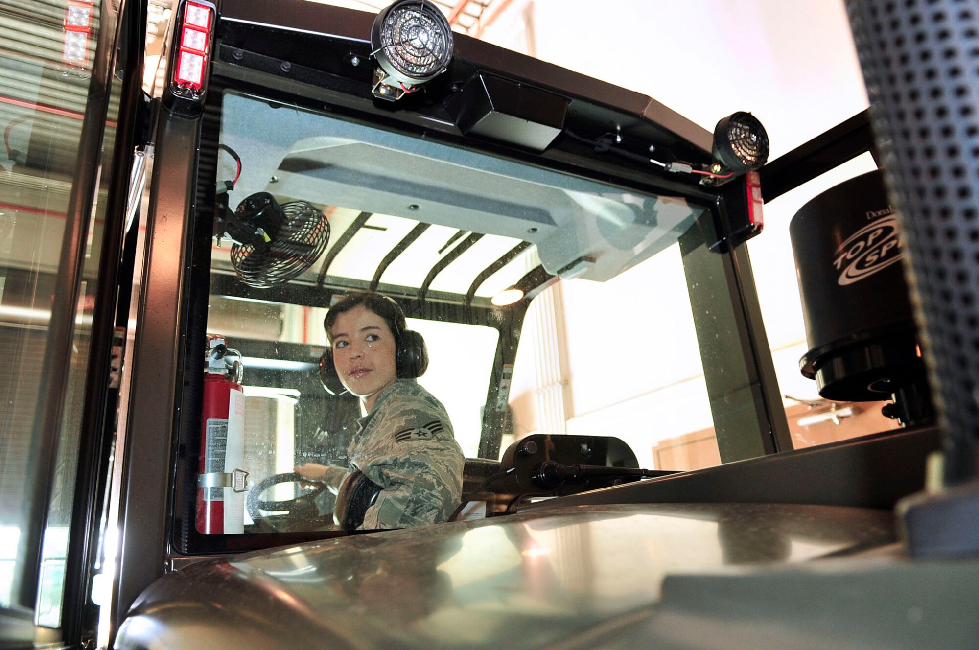 U.S. Air Force Senior Airman Maribel Gonzalez, 20th Medical Support Squadron medical logistics journeyman, uses a fork lift to move a pallet of medical supplies at Shaw Air Force Base, S.C., May 30, 2012.  Because of her outstanding enlisted record, Gonzalez has earned the opportunity to attend Officer Training School for 12 weeks at Maxwell AFB, Ala. and earn an officer's commission.(U.S. Air Force photo by Airman Nicole Sikorski/Released)