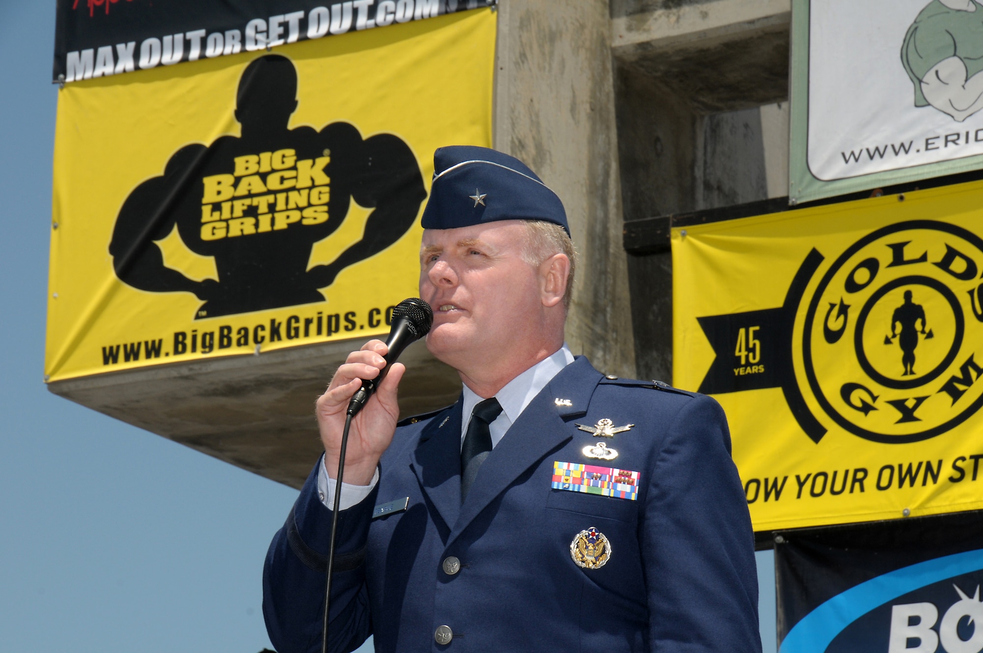 Brigadier Gen. Roger Teague, Space and Missile Systems Center vice commander, speaks during the Muscle Beach Classic’s military tribute, May 28. (Photo by Joe Juarez)