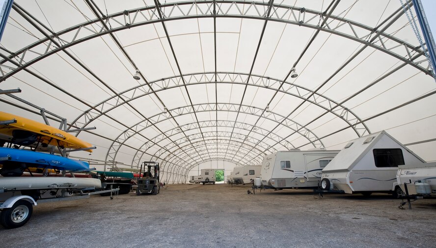 Camping trailers and boating equipment are protected from the elements inside the new Outdoor Recreation storage facility on Barksdale Air Force Base, La., May 30. The new facility, located next to the Outdoor Recreation office, provides 4,000 square feet of storage space for any equipment not in use by customers. (U.S. Air Force photo/Staff Sgt. Chad Warren)(RELEASED)