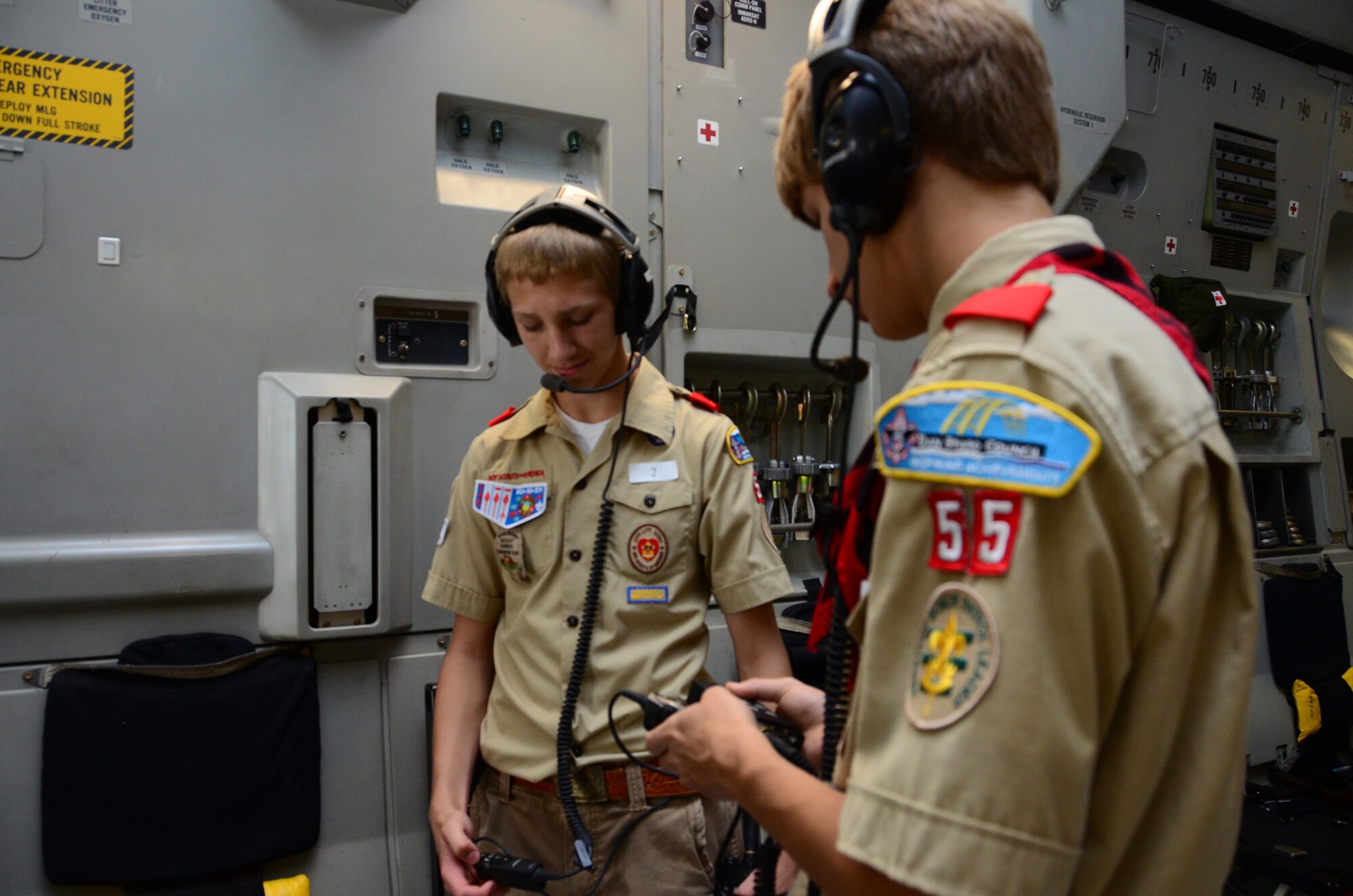 WRIGHT-PATTERSON AIR FORCE BASE, Ohio - Two Boy Scouts communicate with each other using headsets provided by the 445th Aeromedical Evacuation Squadron as part of an AES demonstration during the May 19 445th Airlift Wing's Scouts Day. Approximately 200 Boy and Girl Scouts from across Ohio and Michigan enjoyed various activities on the flightline (U.S. Air Force photo/Staff Sgt. Amanda Duncan)