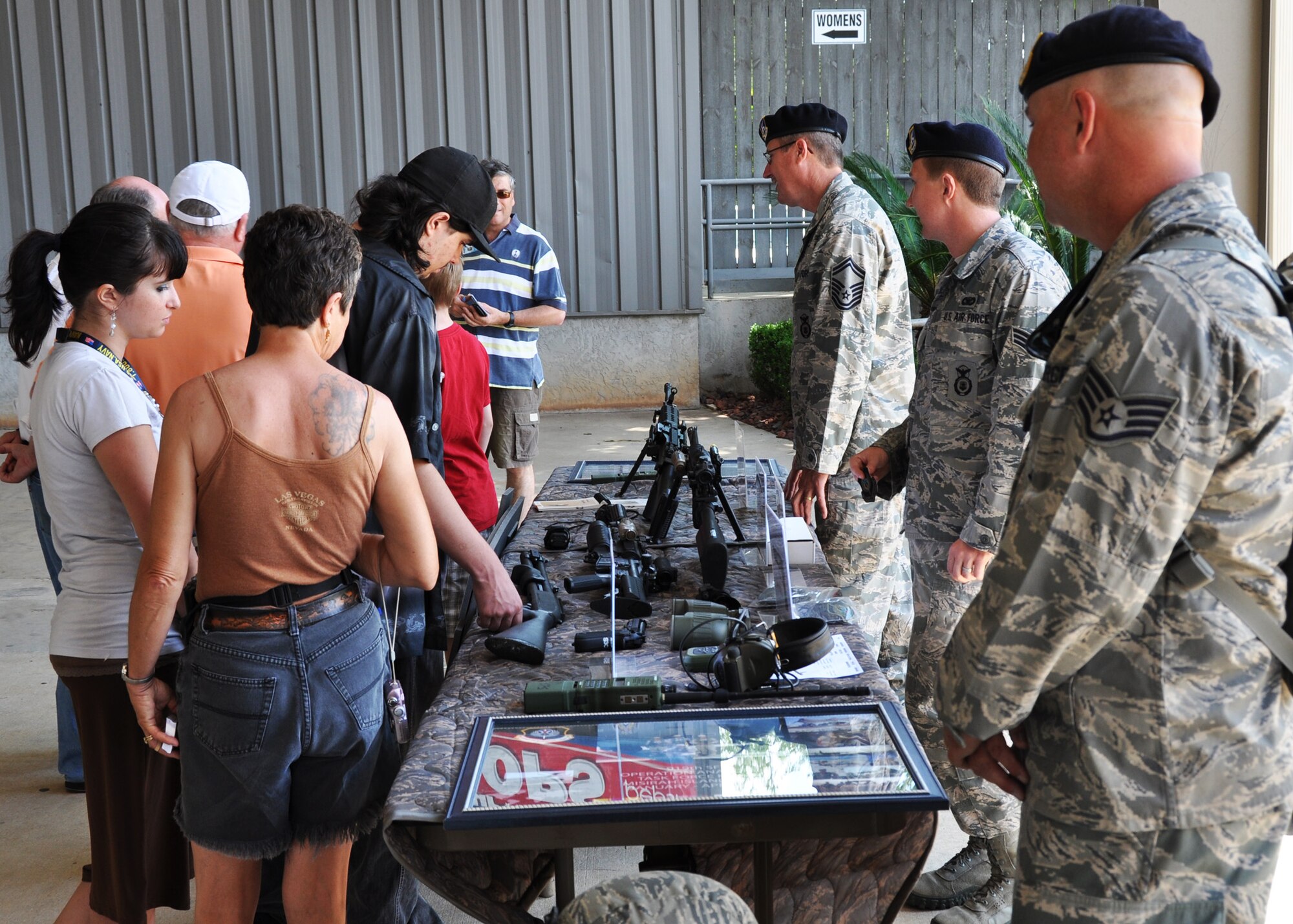 Members of the 919th Security Forces Squadron display some of their combat arms for visitors at the Military Appreciation Recognition Celebration event May 19 in Crestview.  The Duke Field reservists joined their sister service units at the non-profit MARC organization's Armed Forces Day salute to the area's military men and women.   (Courtesy photo)