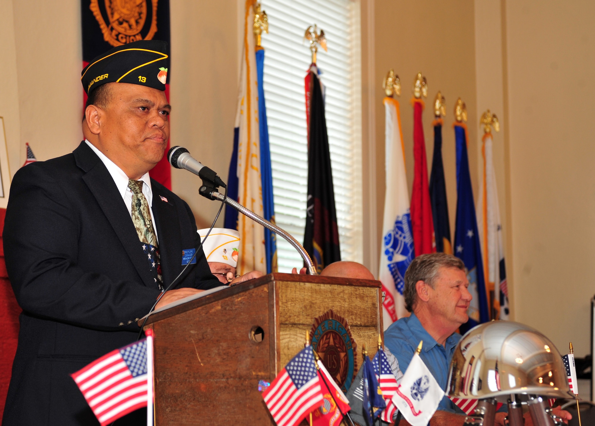 Ernie Florig, American Legion Post 13 commander, recognizes the veterans in the audience and gives thanks for their service during a Memorial Day ceremony held in Valdosta, Ga., May 28, 2012.  Members of the American Legion Post 13 placed flags on every veteran tombstone at Sunset Hills cemetery in honor of the sacrifices they have made. (U.S.  Air Force photo by Staff Sgt. Stephanie Mancha/Released)
