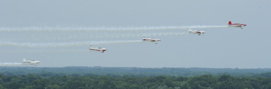 WHITEMAN AIR FORCE BASE, Mo. -- Wing Nuts Flying Circus performs during the 2012 Wings Over Whiteman Open House and Air Show May 20. Whiteman AFB hosted a two-day open house and air show here May 19 and 20, 2012, which included demonstrations of military capabilities and static aircraft displays. (U.S. Air Force photo/Airman 1st Class Bryan Crane)(Released)