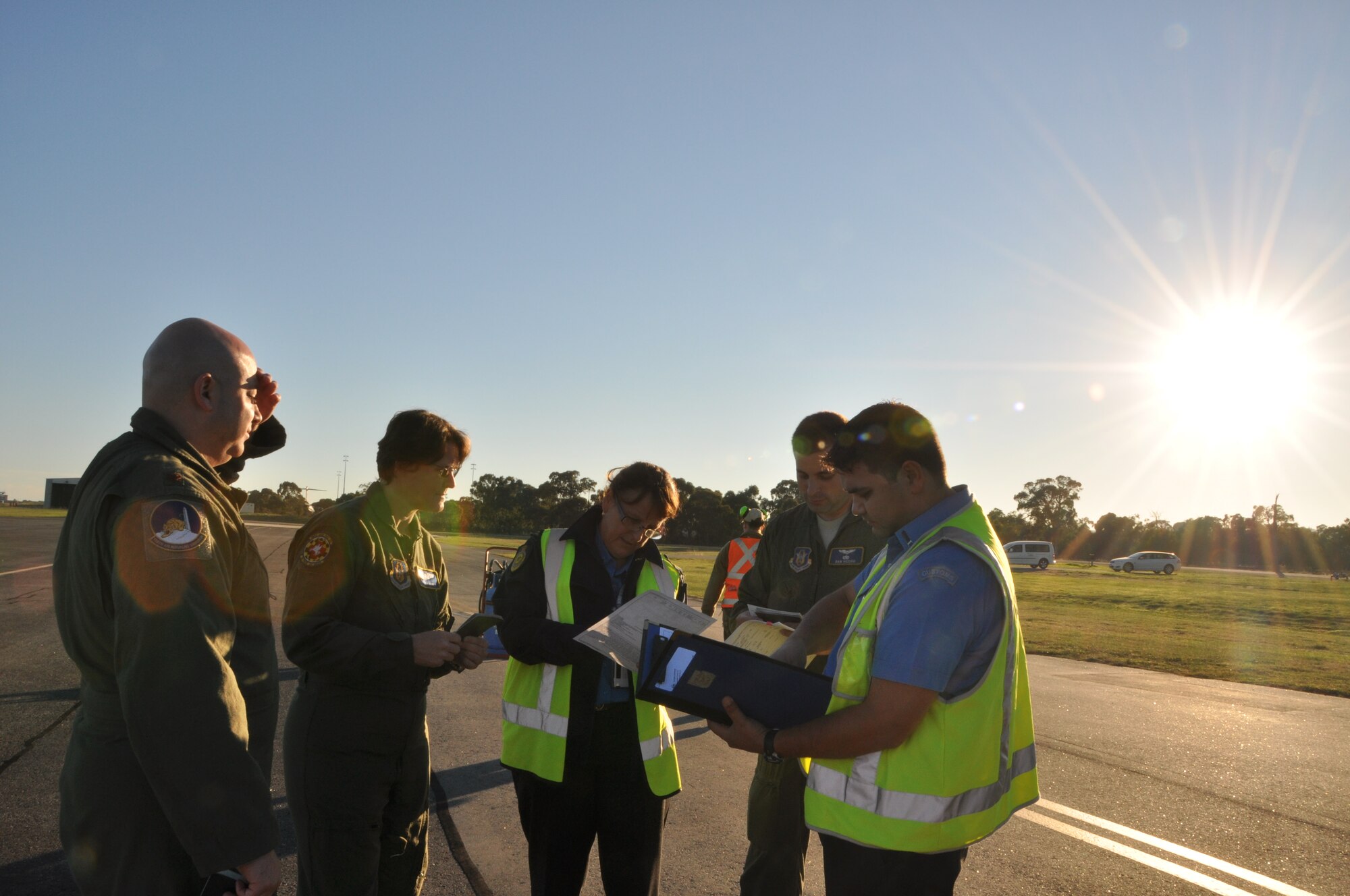 Members from the 459th Air Refueling Wing check-in with Australian Customs and Border Protection by providing necessary documentation to enter and leave Australia, May 20, 2012. The group received training for customs procedures and other aspects of overseas travel during an international mission to Pearce, Australia in support of the Royal Australian Air Force for the Defense Forces Air Show, May 19-20.  (U.S. Air Force photo/Senior Airman Katie Spencer) Eds. Note [Eds. The spelling Defence is in original document]