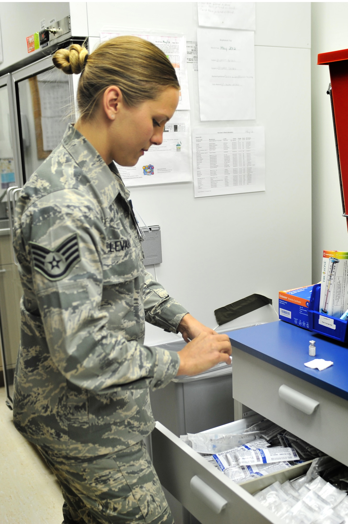 U.S. Air Force Staff Sgt. Dena Levari, 27th Special Operations Medical Operations Squadron NCOIC of immunizations, prepares a Tetanus, Diphtheria, Pertussis vaccination for a patient in the clinic at Cannon Air Force Base, N.M., May 29, 2012. The Tdap vaccine protects against those viruses that can cause illness like lockjaw and whooping cough. (U.S. Air Force photo by Airman 1st Class Alexxis Pons Abascal)  