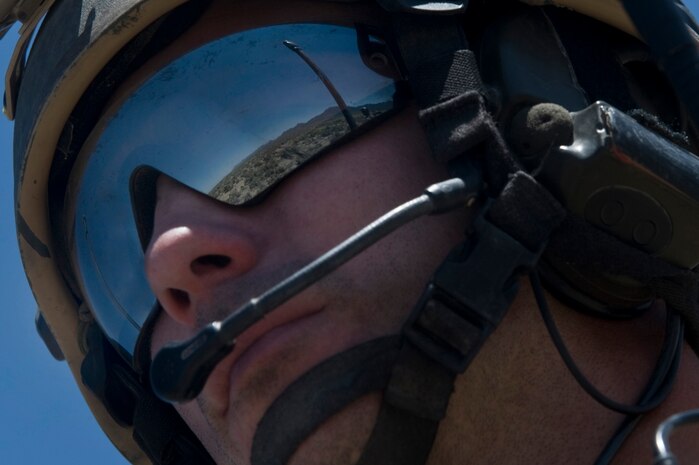 U.S. Air Force Staff Sgt. Colby Fulton, 23rd Special Tactics Squadron combat controller from Hurlburt Air Force Base, Fla., looks over the range for C-130 Hercules planes during Mobility Air Forces Exercise May 23, 2012, on the Nevada Test and Training Range. Members of the squadron controlled the landing zone. (U.S. Air Force photo by Airman 1st Class Daniel Hughes)