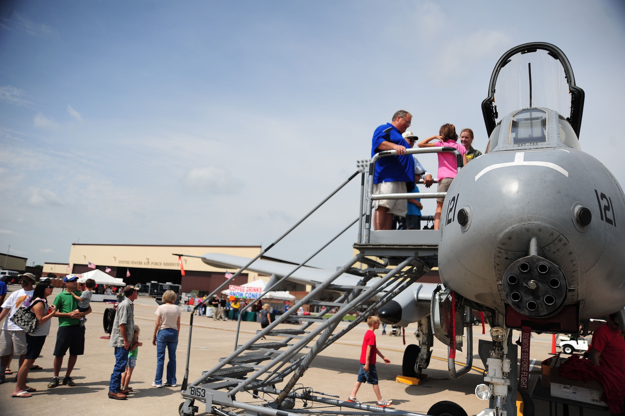 WHITEMAN AIR FORCE BASE, Mo. -- Spectators view and take photos of an A-10 Thunderbolt II from the 442nd Fighter Wing during the 2012 Wings Over Whiteman Open House and Air Show May 20, 2012. The A-10 is the first Air Force aircraft specially designed for close-air support of ground forces. (U.S. Air Force photo/Senior Airman Nick Wilson) (Released)