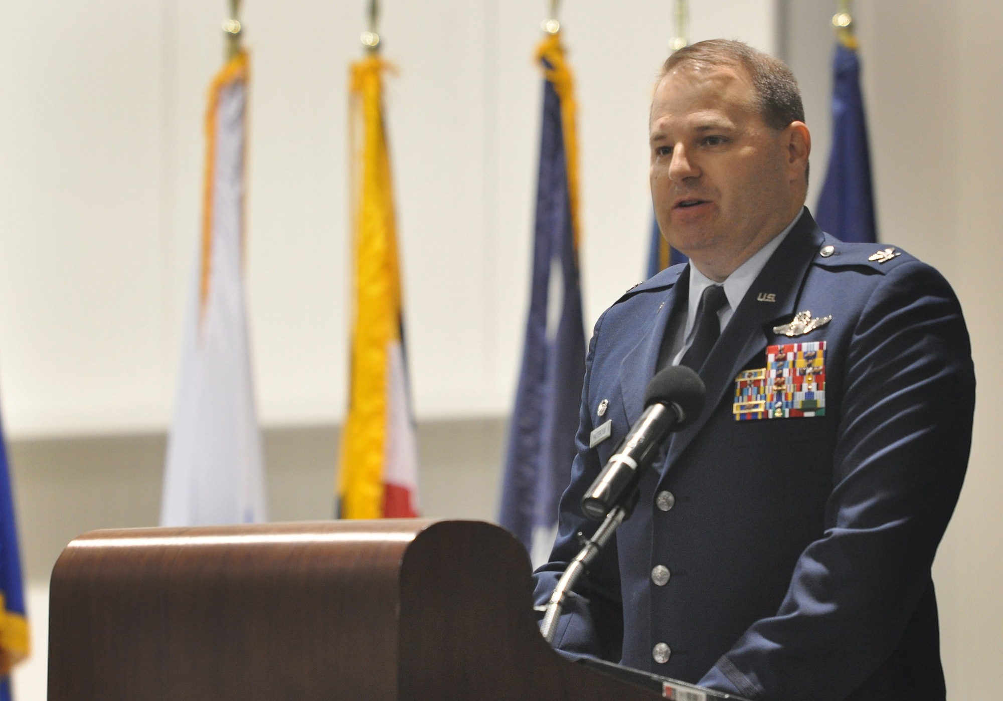 Colonel Chris Patterson, 621st Contingency Response Wing commander, provides remarks during the inactivation ceremony of the 615 CRW, May 29, 2012, at Travis Air Force Base, Calif. The 615 CRW ceased its operations as a sister wing, ending seven years of mobility excellence. The inactivation ceremony also included the transfer of command of the two contingency response groups and one contingency operations group to the 621st Contingency Response Wing, headquartered at Joint Base McGuire-Dix-Lakehurst, N.J. (U.S. Air Force Photo / Master Sgt. Stan Parker)