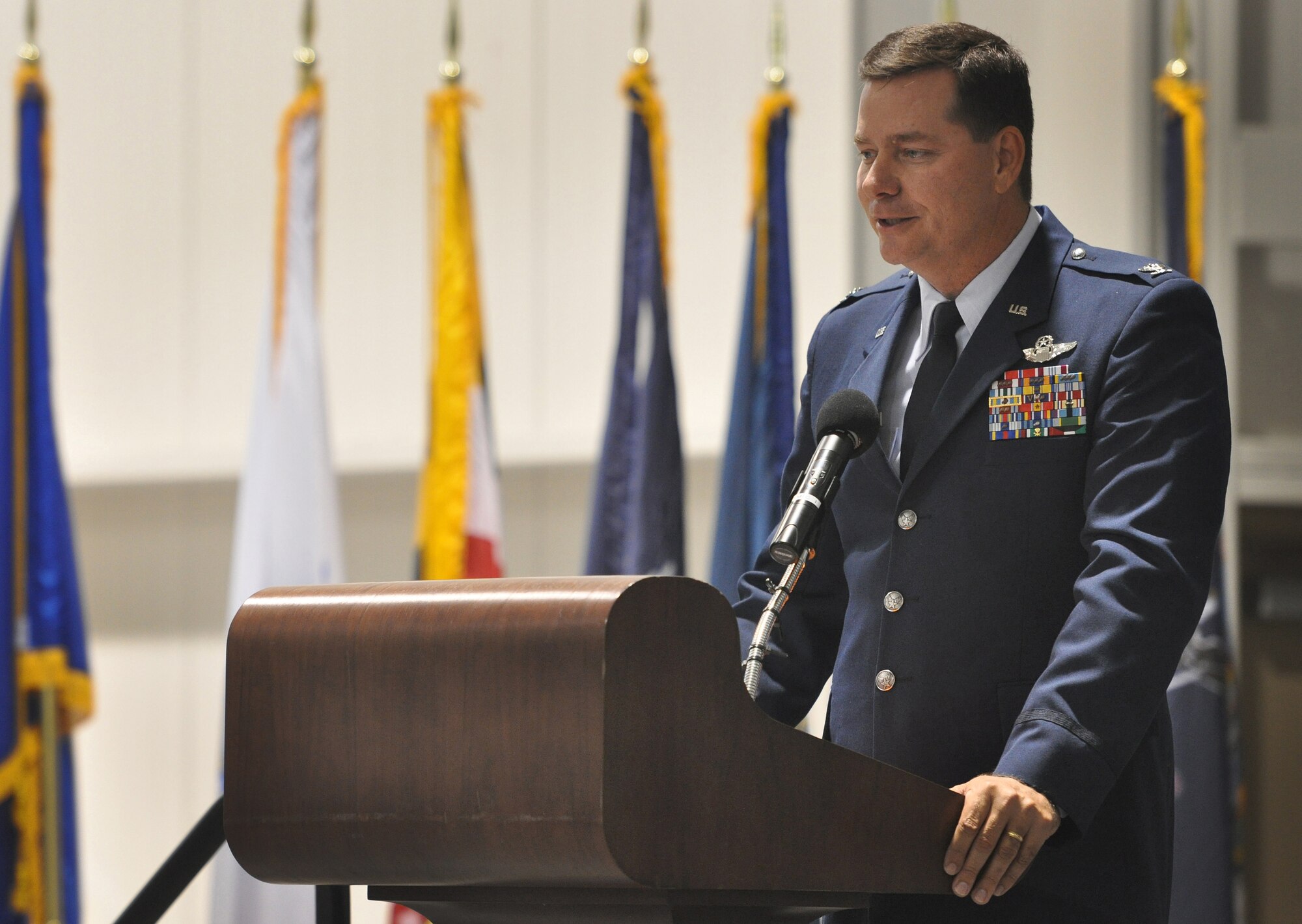 Colonel Gary Gottschall, former 615th Contingency Response Wing commander, provides remarks during the inactivation ceremony for his wing, May 29, 2012, at Travis Air Force Base, Calif. The 615 CRW ceased its operations as a sister wing, ending seven years of mobility excellence. The inactivation ceremony also included the transfer of command of the two contingency response groups and one contingency operations group to the 621st Contingency Response Wing, headquartered at Joint Base McGuire-Dix-Lakehurst, N.J. (U.S. Air Force Photo / Master Sgt. Stan Parker)