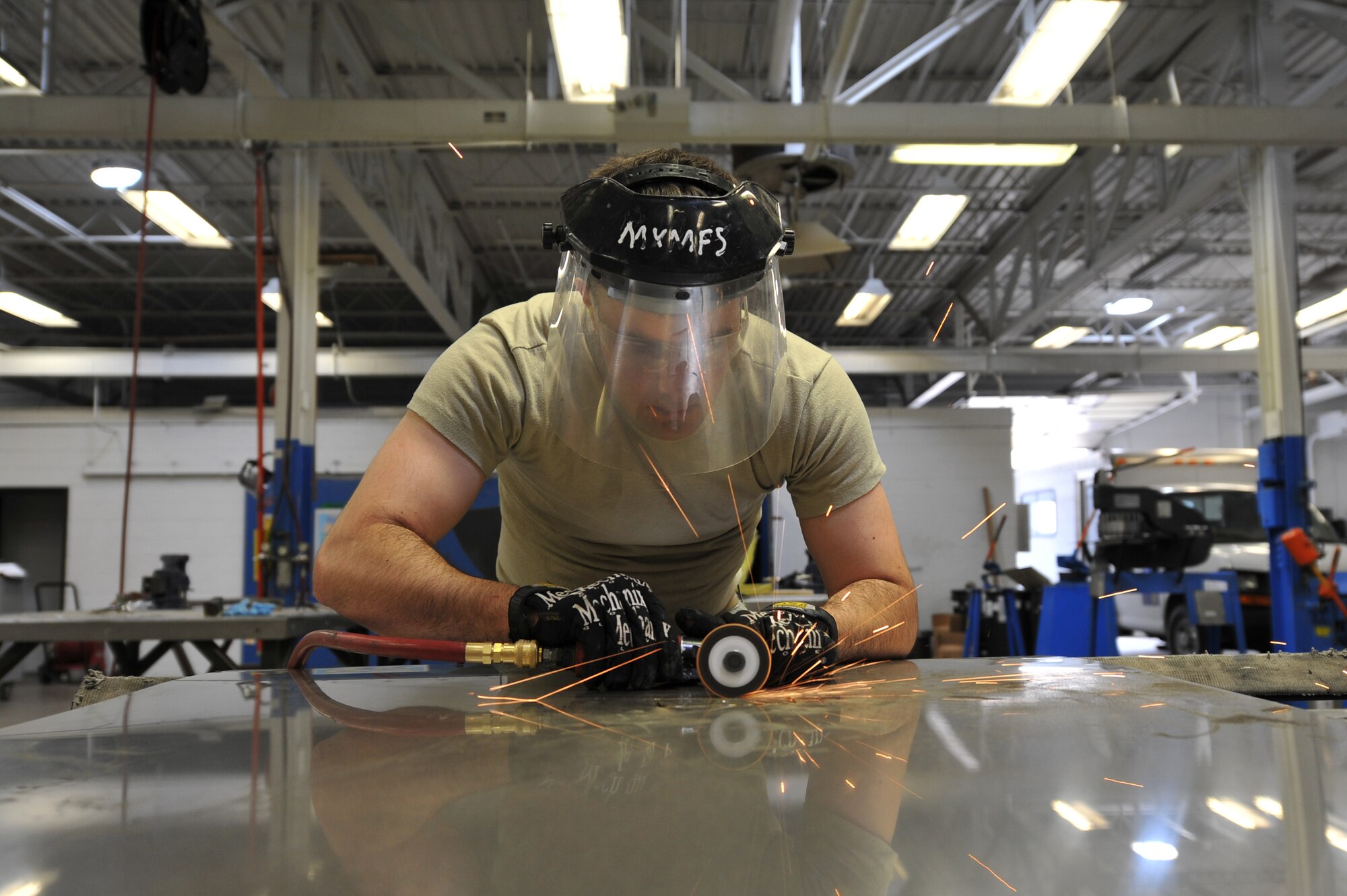 MINOT AIR FORCE BASE, N.D.-- Senior Airman Larry Horstman, 5th Maintenance Squadron aircraft structural maintenance journeyman, fabricates aircraft parts here May 22. The 5th MXS supports the 5th Bomb Wing by providing equipment maintenance on its B-52H Stratofortresses. (U.S. Air Force photo/Senior Airman Brittany Y. Auld)