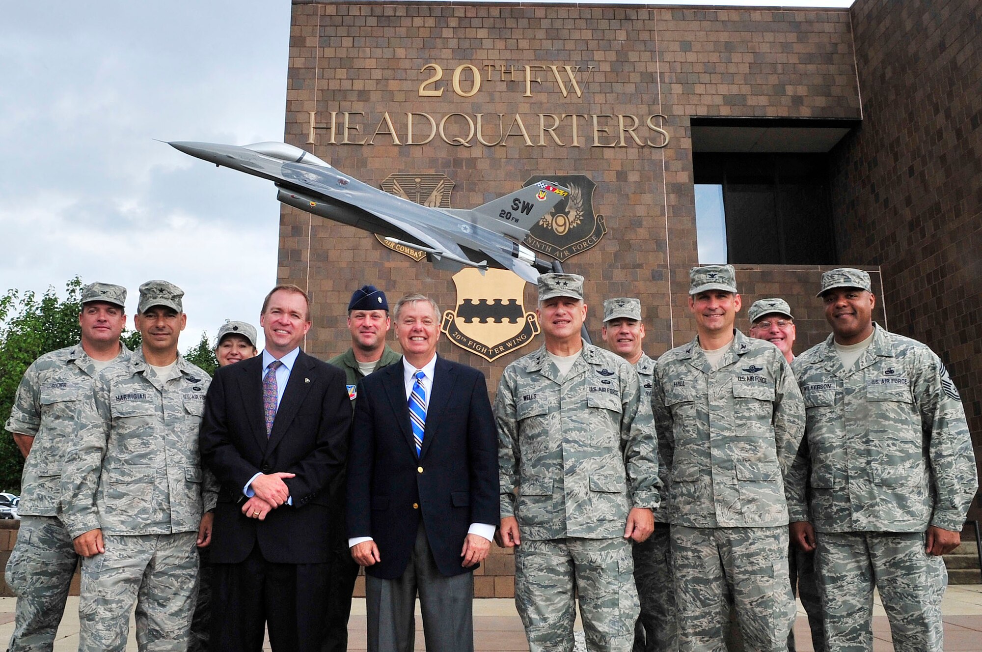 Sen. Lindsey Graham, S.C. senator, and U.S. Rep. Mick Mulvaney, 5th congressional district S.C. (center), pose for a group photo with Shaw Air Force Base commanders and chiefs outside of the the 20th Fighter Wing headquarters building, while visiting Shaw Air Force Base, S.C., May 30, 2012.(U.S. Air Force photo by Airman Nicole Sikorski/Released)