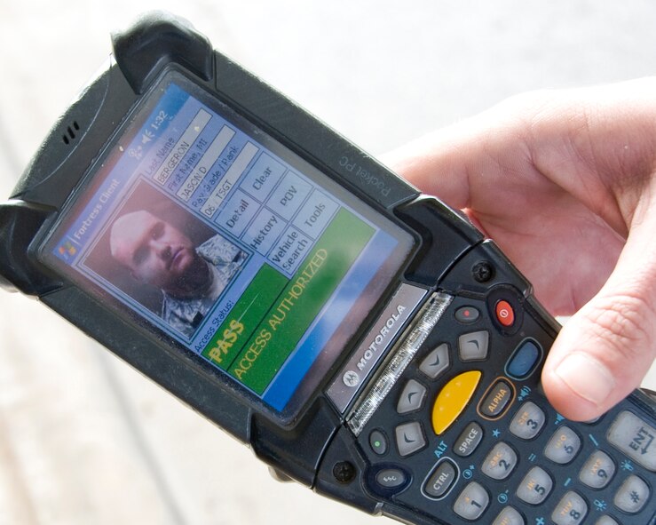 The Defense Biometric Identification System (DBIDS) scanner used by security forces allows the entry controller to see the card holder’s picture and information in detail.   Starting Jun 1, card holders will no longer be required to go to the Sheppard Air Force Base visitor’s center to register their cards in the DBIDS system. (U.S. Air Force photo/Frank H. Carter)