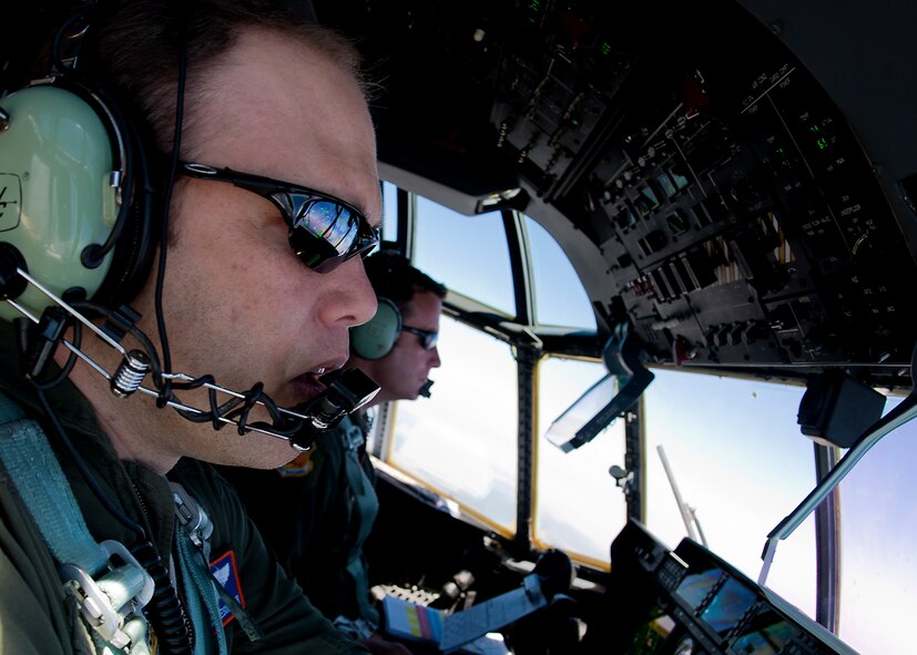U.S. Air Force Capt. Seth Schwesinger, 317th Airlift Group, flies a C-130J toward the Nevada Test and Training Range May 23, 2012 to support the Mobility Forces Exercise. MAFEX included units from multiple services around the world, synchronized to arrive on the Nevada range in an orchestrated, combined force. The exercise combined airborne drops and landings on an unimproved landing strip, delivering approximately 100 paratroops and supporting equipment. (U.S. Air Force photo by Airman 1st Class Damon Kasberg /Released)