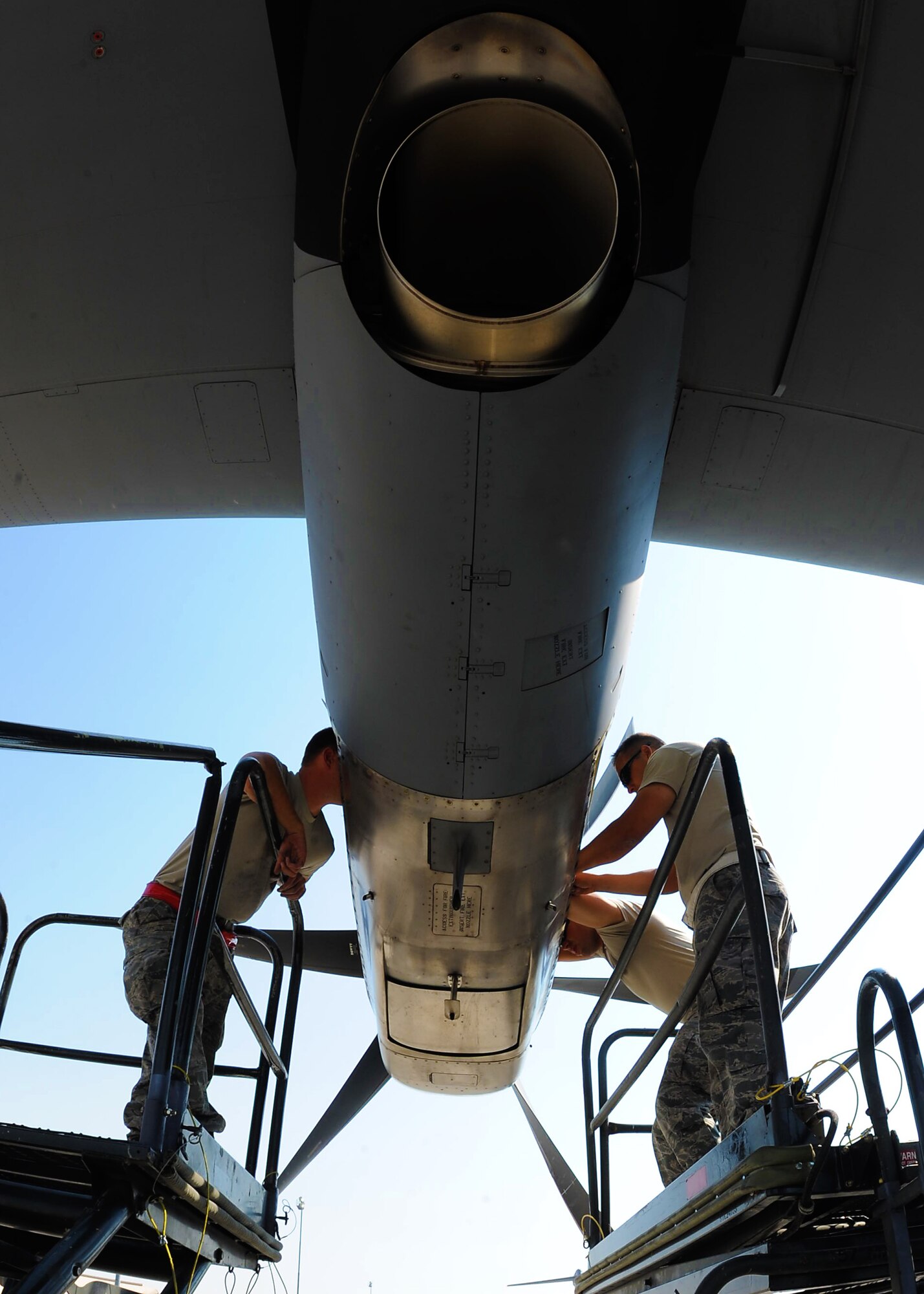 U.S. Air Force Staff Sgt. Douglas Wells, 317th Aircraft Maintenance Squadron, performs engine repairs prior to the aircraft taking part in the Mobility Forces Exercise at Nellis Air Force Base, Nev. May 23, 2012. The mass air mobility exercise, in which nearly 70 aircraft primarily consisting of C-17 Globemaster III and C-130 aircraft, practiced a "forced entry" operation. In the scenario, U.S. forces entered a simulated defended enemy country, defeated defending air defense forces and put troops on the ground. (U.S. Air Force photo by Airman 1st Class Damon Kasberg /Released)