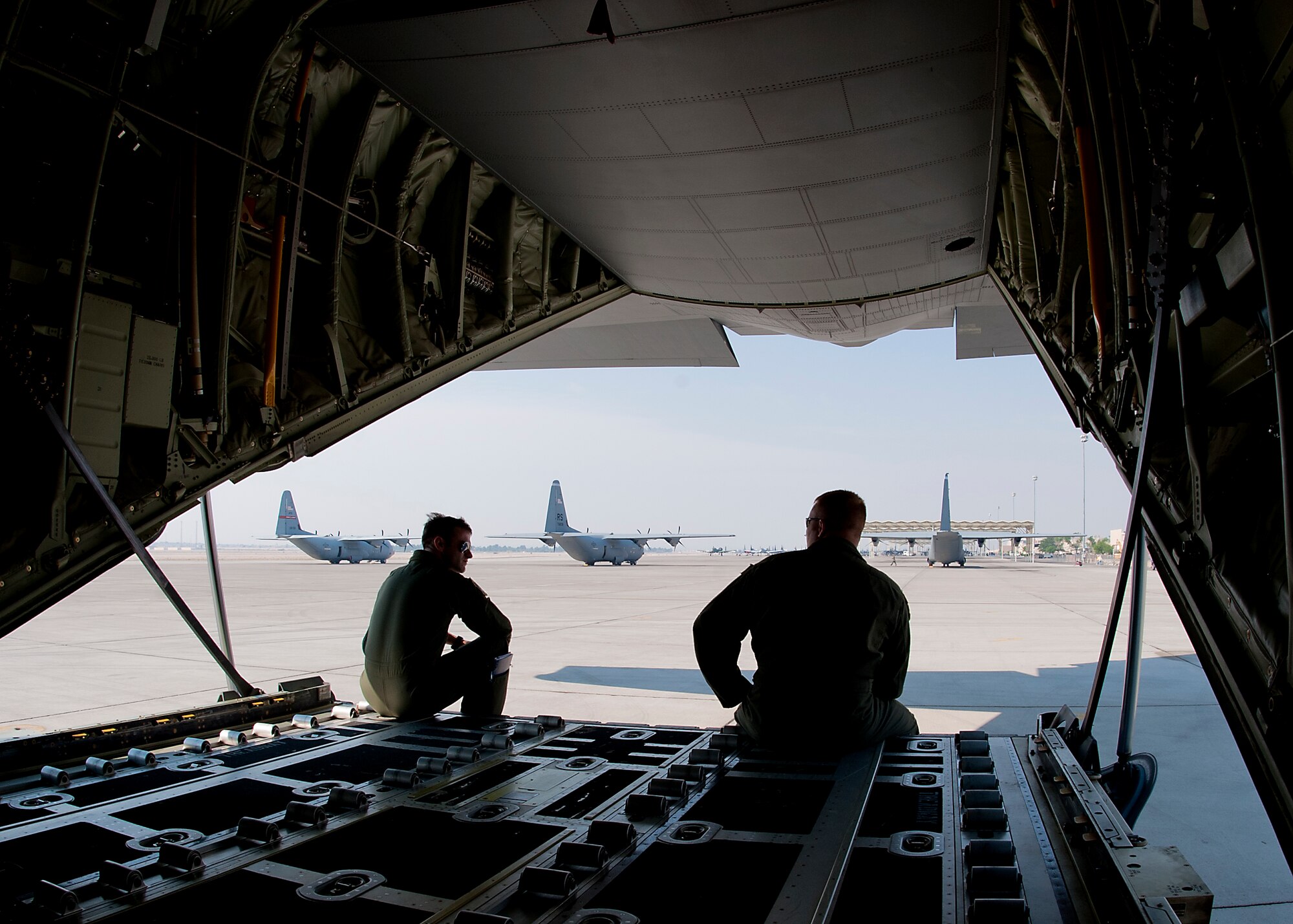 U.S. Air Force Staff Sgt. Terry Wall, 317th Aircraft Maintenance Squadron, puts the external power on a C-130J May 23, 2012, prior to the aircraft taking part in the Mobility Forces Exercise at Nellis Air Force Base, Nev. The Mobility Forces Exercise included units from multiple services around the world, synchronized to arrive on the Nevada range in an orchestrated, combined force. The exercise combined airborne drops and landings on an unimproved landing strip, delivering approximately 100 paratroops and supporting equipment. (U.S. Air Force photo by Airman 1st Class Damon Kasberg /Released)