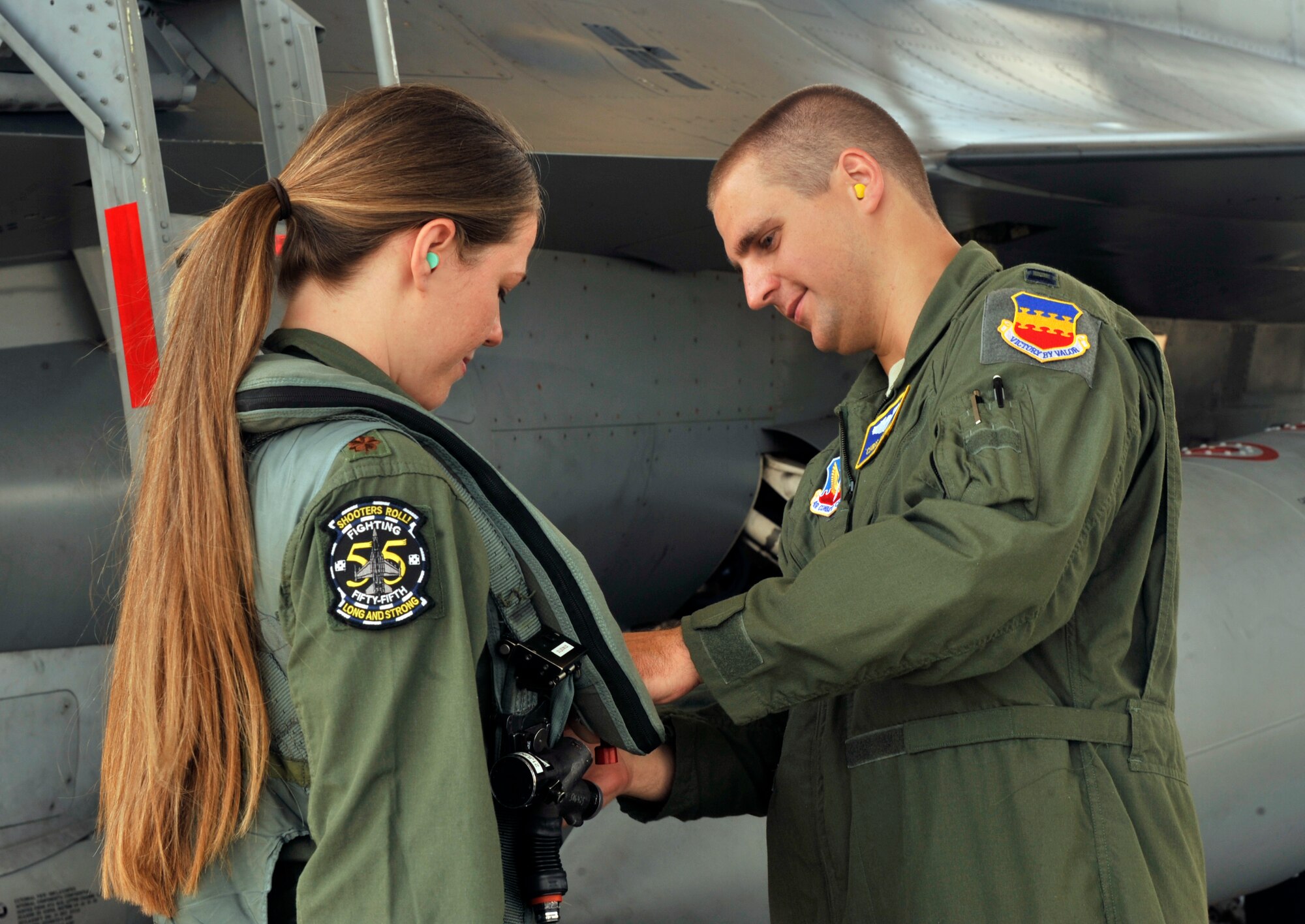 The 55th Fighter Squadron taxied about 28 spouses from the 55th FS and 20th Aircraft Maintenance Squadron, down the runway at Shaw Air Force Base, S.C, May 24, 2012. The 55th FS thanked the spouses for their continuing support with back to back deployments to Aviano, Libya and the Republic of Korea. The deployments played a major role during Operation Unified Protector. (U.S. Air Force photo by Senior Airmen Tabatha McCarthy/released)