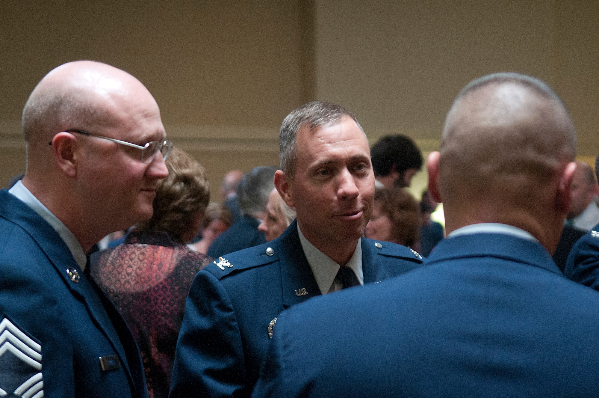 Col. Tom Wilcox, 90th Security Forces Group commander, and Chief Master Sgt. Daniel Arvin, 90th Security Forces Group chief enlisted manager, are among the F. E. Warren Airmen socializing prior to the start of the Air Force Association’s Armed Forces Day Banquet in the Cheyenne Holiday Inn May 18. (U.S. Air Force photo by R.J. Oriez)