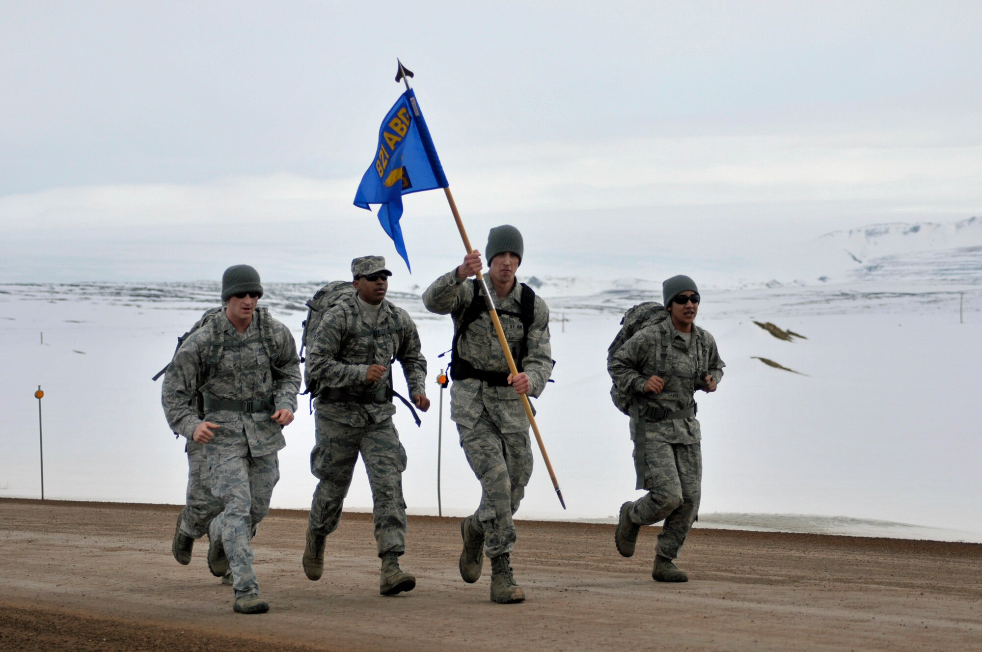 THULE AIR BASE, Greenland - The 821 Security Forces Squadron celebrated Police Week with a variety of activities, including a 9.3 mile ruck march May 18. Police week is a national observance that was created in 1962 when President John F. Kennedy signed a proclamation designating May 15 as Peace Officers Memorial Day, and the week in which that date falls as Police Week. Thule AB is located about 750 miles north of the Arctic Circle, and is operated by the 821st Air Base Group, one of six installations operated by the 21st Space Wing. (U.S. Air Force photo/Senior Airman Zhenhua Xie)
