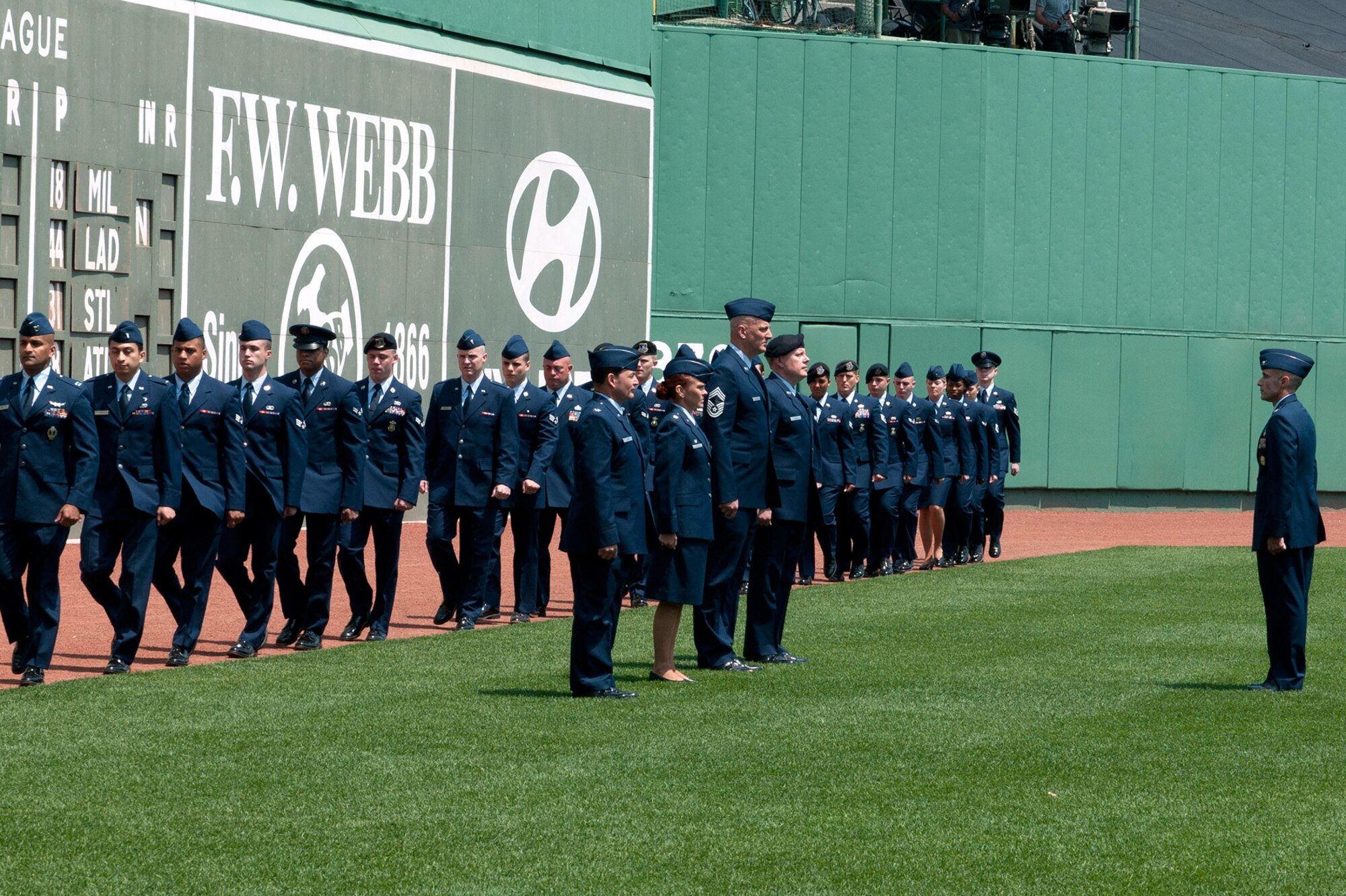 BOSTON – Col. Lester A. Weilacher, 66th Air Base Group commander, commands a flight of Airmen from Hanscom AFB as they march onto the warning track at Fenway Park for a pre-game ceremony May 28. Members participated in the on-field ceremony commemorating Memorial Day. (U.S. Air Force photo by Rick Berry)