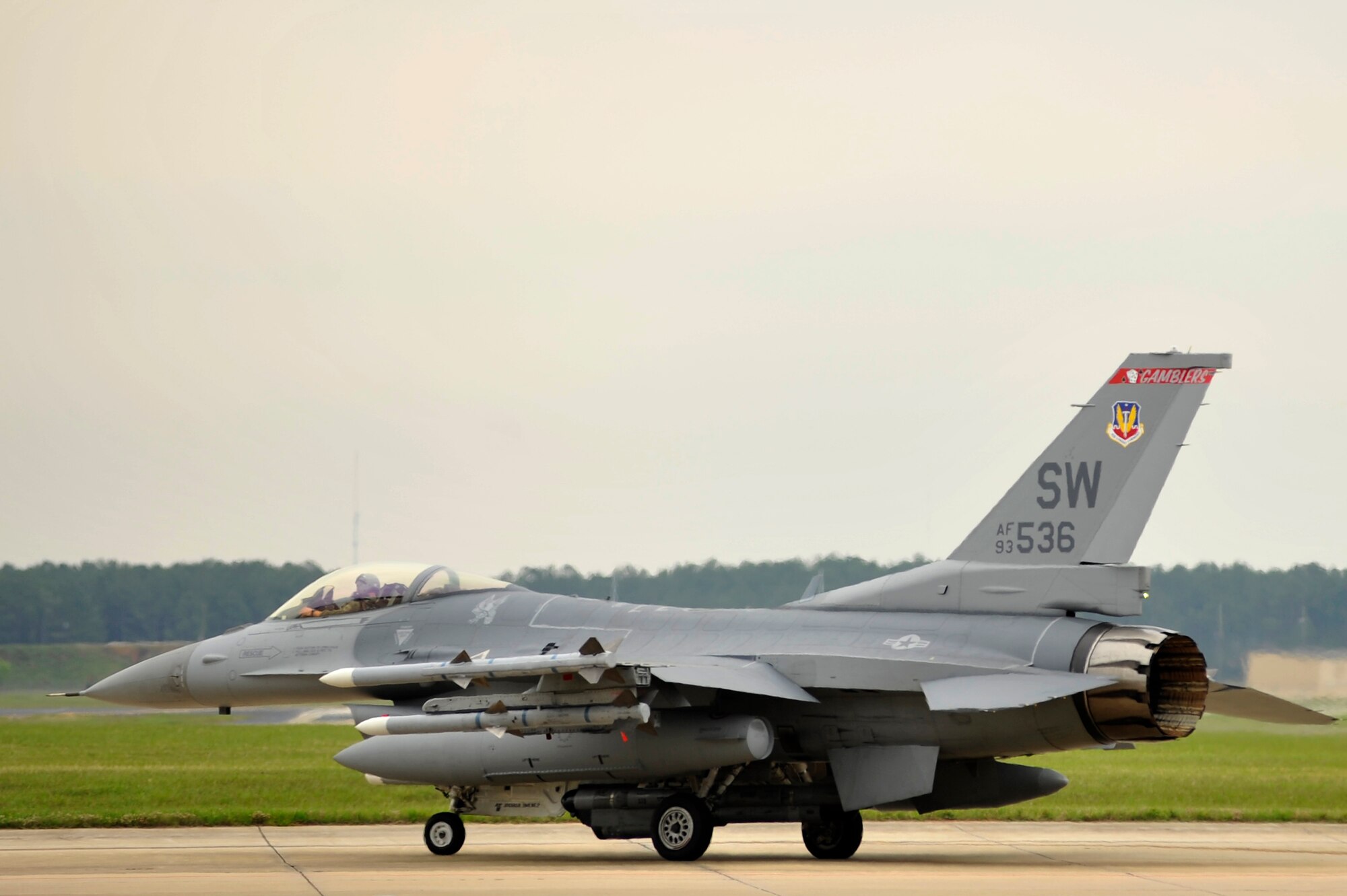 A U.S. Air Force F-16 Fighting Falcon assigned to Shaw Air Force Base, S.C., taxies onto the ramp while participating in an elephant walk during an Operational Readiness Exercise, May 22, 2012, Shaw AFB, S.C. An elephant walk occurs when aircraft taxies down the runway in large numbers, which represents the ability to generate a large number of aircraft needing to take off rapidly for a military response. (U.S. Air Force photo by Senior Airman Kenny Holston/Released)


