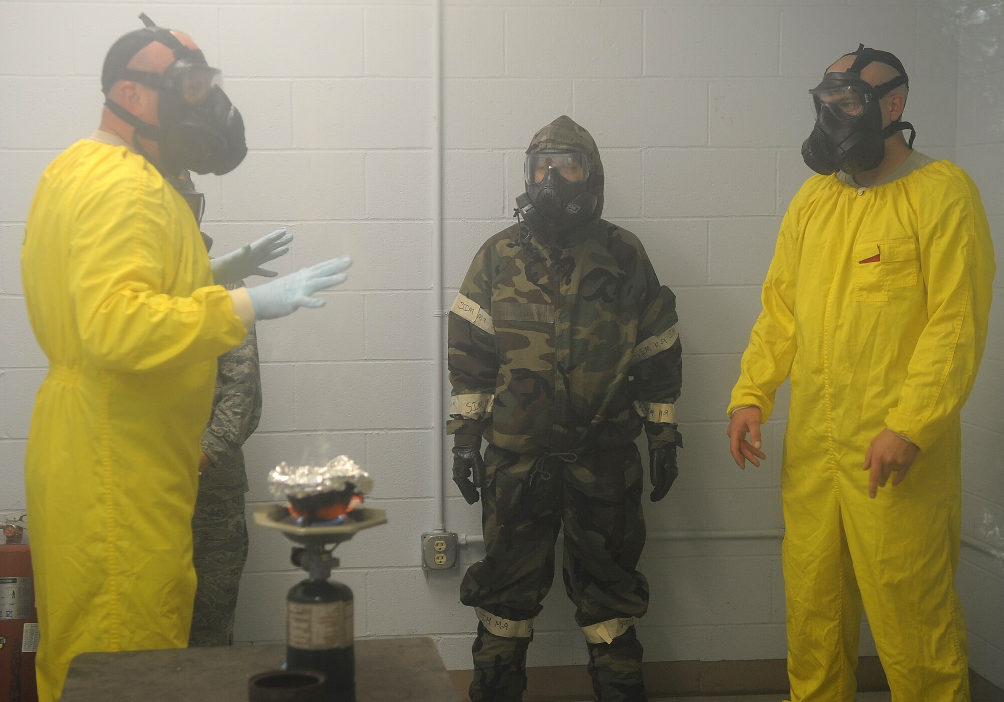 U.S. Air Force Tech. Sgt. Thomas Breckel briefs Airmen during gas chamber training on Seymour Johnson Air Force Base, N.C., May 24, 2012. While in the chamber Airmen performed different exercises to open skin pores which allows chemicals to quickly exit the body and reduce effects of the chemical agent. Breckel, 4th Civil Engineer Squadron NCO in charge of plans and operations, hails from Wilmington, Ohio. (U.S. Air Force photo/Senior Airman Gino Reyes/Released) 