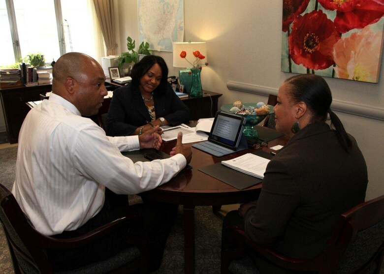 WASHINGTON — Tim Goodrich (left), is the president of Timitron Corp., a service-disabled veteran-owned small business.  He is briefing Jackie Robinson-Burnette, chief of the USACE Small Business Program, and Simone Jackson, chief of Small Business Policy, about his firm’s capabilities and his interest in doing business with USACE. 