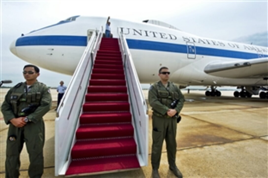 Defense Secretary Leon E. Panetta waves as he boards an Air Force E4-B on Joint Base Andrews, Md., May 30, 2012. Panetta departed on a 10-day trip to Asia to meet with defense counterparts.