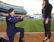 An All-Blue occasion, as Dodger fan, Senior Airman Richard Sauceda of the 163d Security Forces took the field at Dodger Stadium to propose to girlfriend and fellow fan, Stephanie O’Hara, May 14. Senior Airman Sauceda was recognized for his military service prior to the game and with the help of the stadium staff was able to surprise O’Hara with a proposal at the same time. (U.S. Air Force photo by Master Sgt. Julie Avey