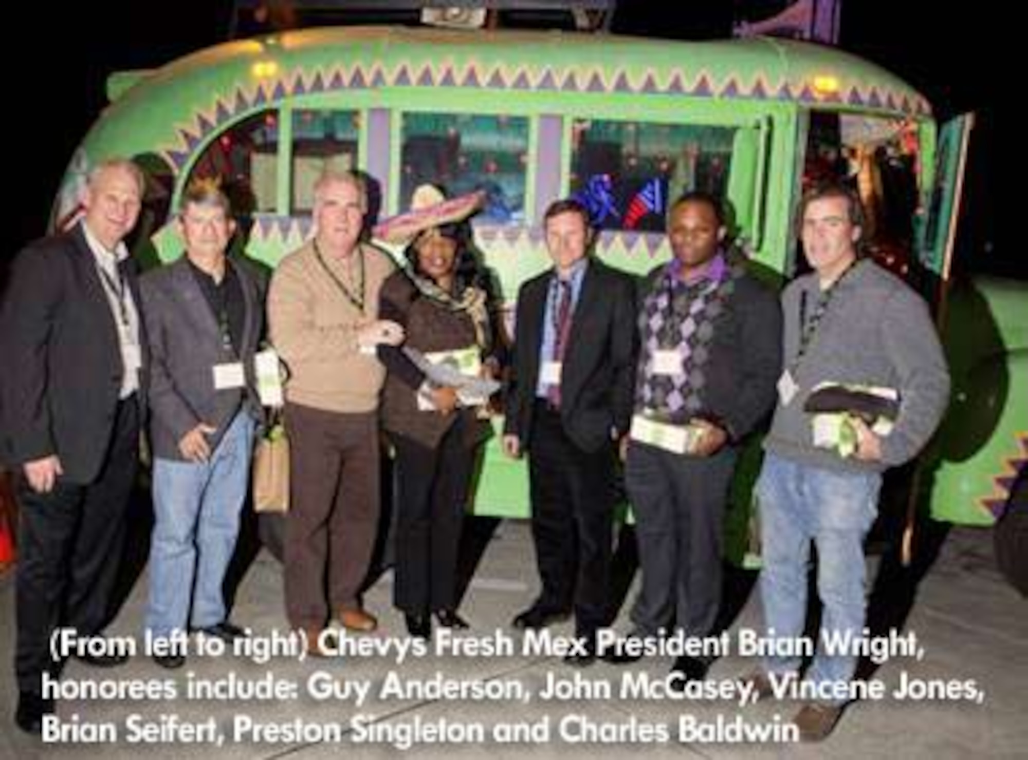 Tech. Sgt. Preston Singleton, 940th Wing Command Post, (second from the right) receives an award for his involvement in the Big Brother/ Big Sister program. Singleton’s mentoring of a little brother is what brought about the recognition.  (Courtesy Photo)