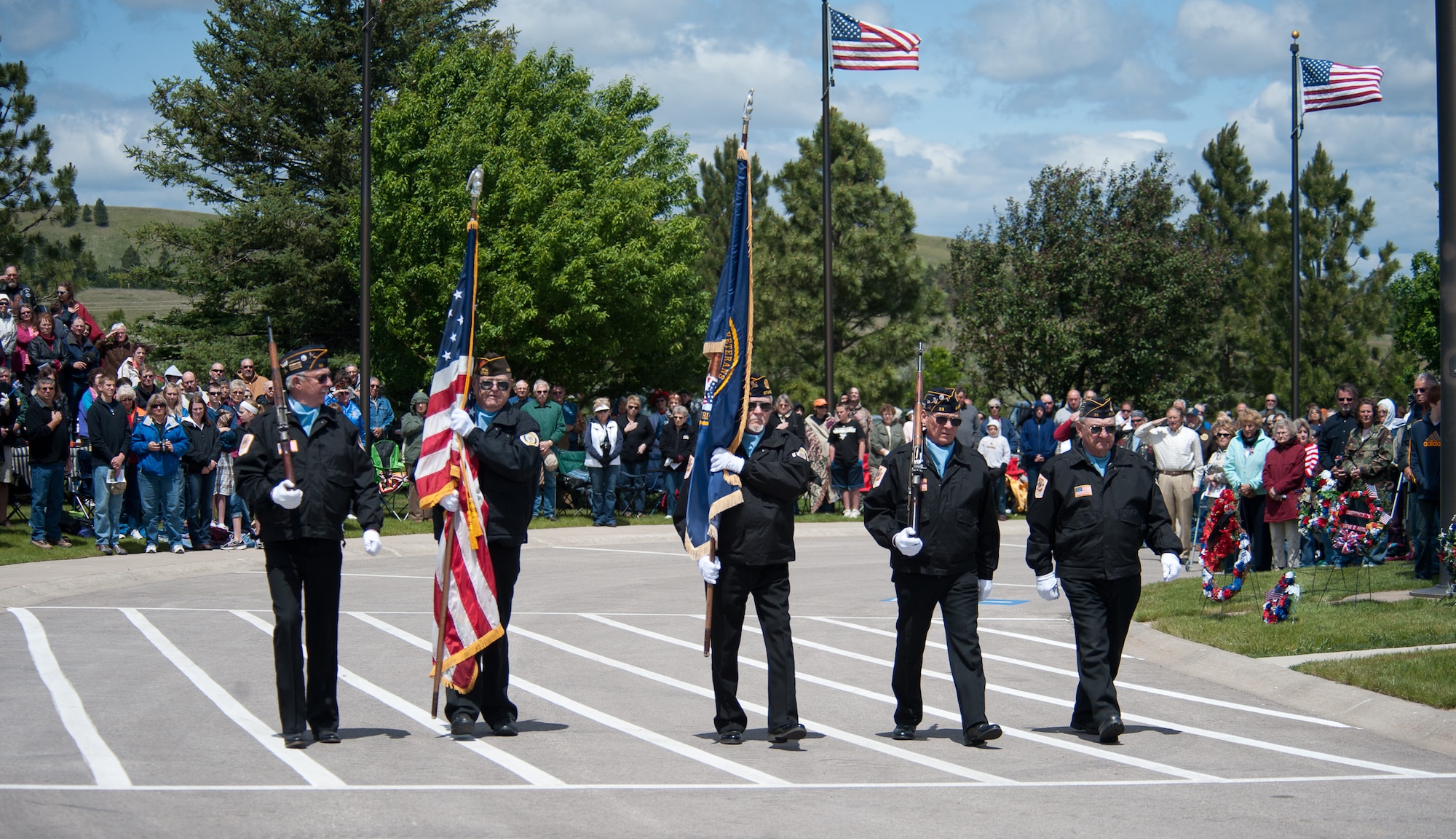 The Sturgis Volunteer Honor Guard retires the colors at the conclusion of the Memorial Day Program at Black Hills National Cemetery, S.D., May 28, 2012. Formerly known as Decoration Day, Memorial Day is a special day established to commemorate U.S. servicemembers who died while serving their country. (U.S. Air Force photo by Airman 1st Class Alystria Maurer/Released)