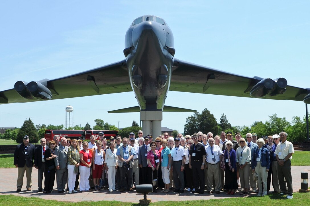 Members of the Legion of Valor pose for a group photograph at Langley Air Force Base, Va., during a tour of the base, May 31, 2012. During the visit, members watched an F-22 Raptor aerial demo, toured the aircraft and participated in a memorial service, honoring the members that passed away since their last annual meeting. (U.S. Air Force photo by Senior Airman Wesley Farnsworth/Released)